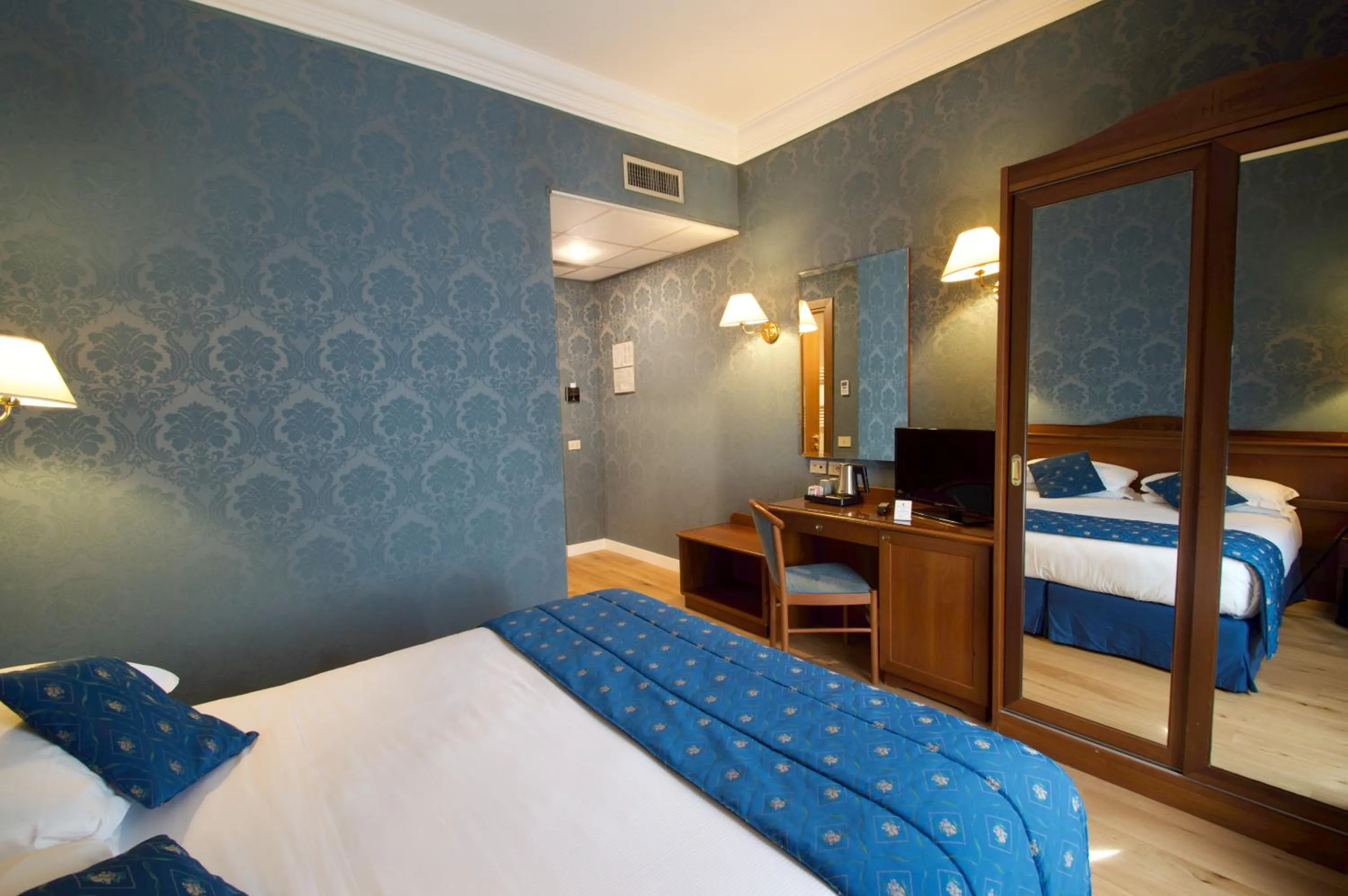 Bed in Hotel Montecarlo