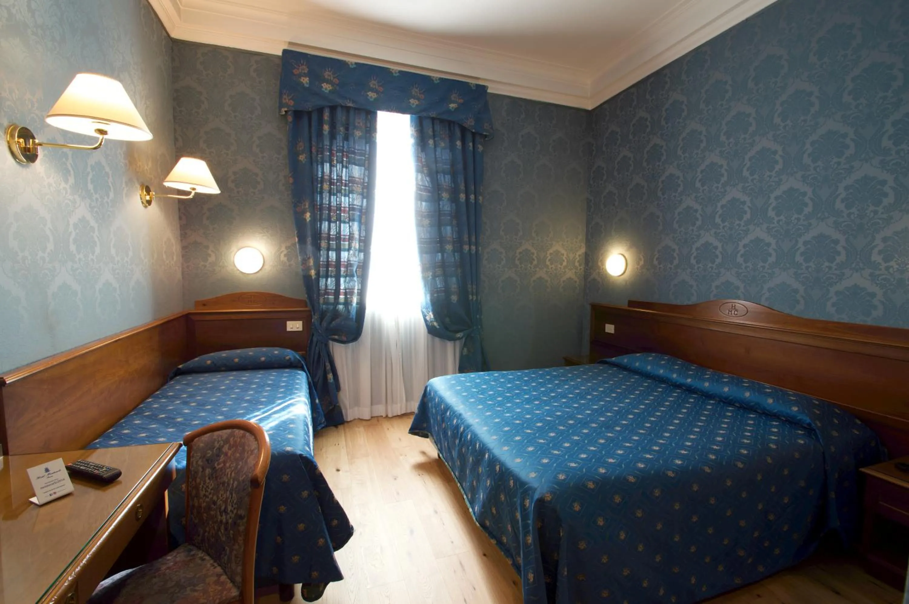 Bed in Hotel Montecarlo