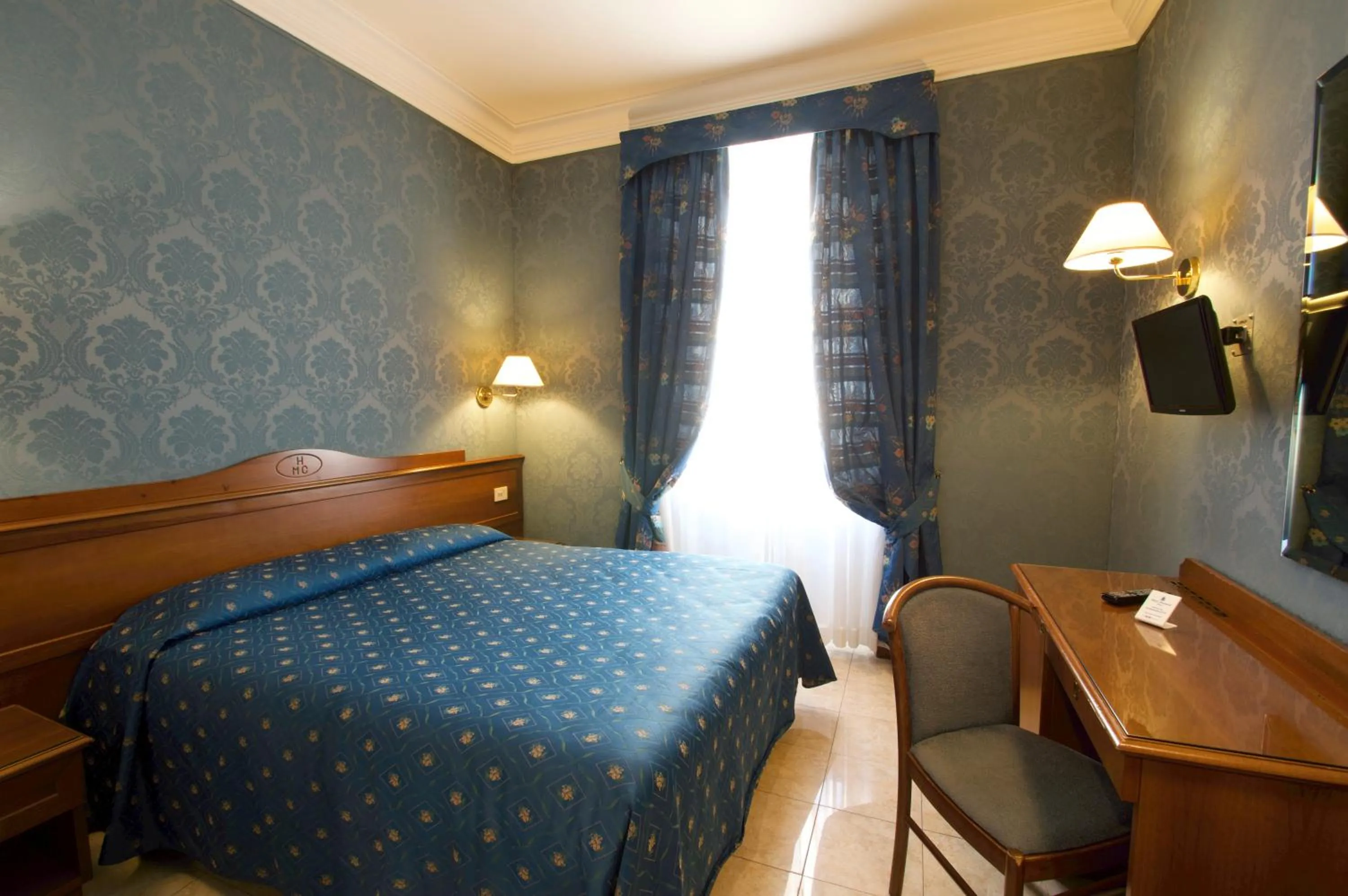 Bed in Hotel Montecarlo