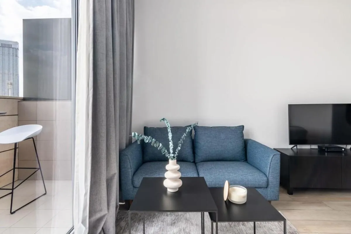 Photo of the whole room in Silkhaus comfy DIFC studio with Burj Khalifa view