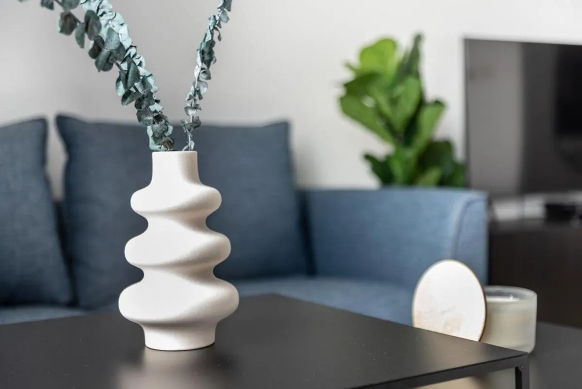 Living room in Silkhaus comfy DIFC studio with Burj Khalifa view