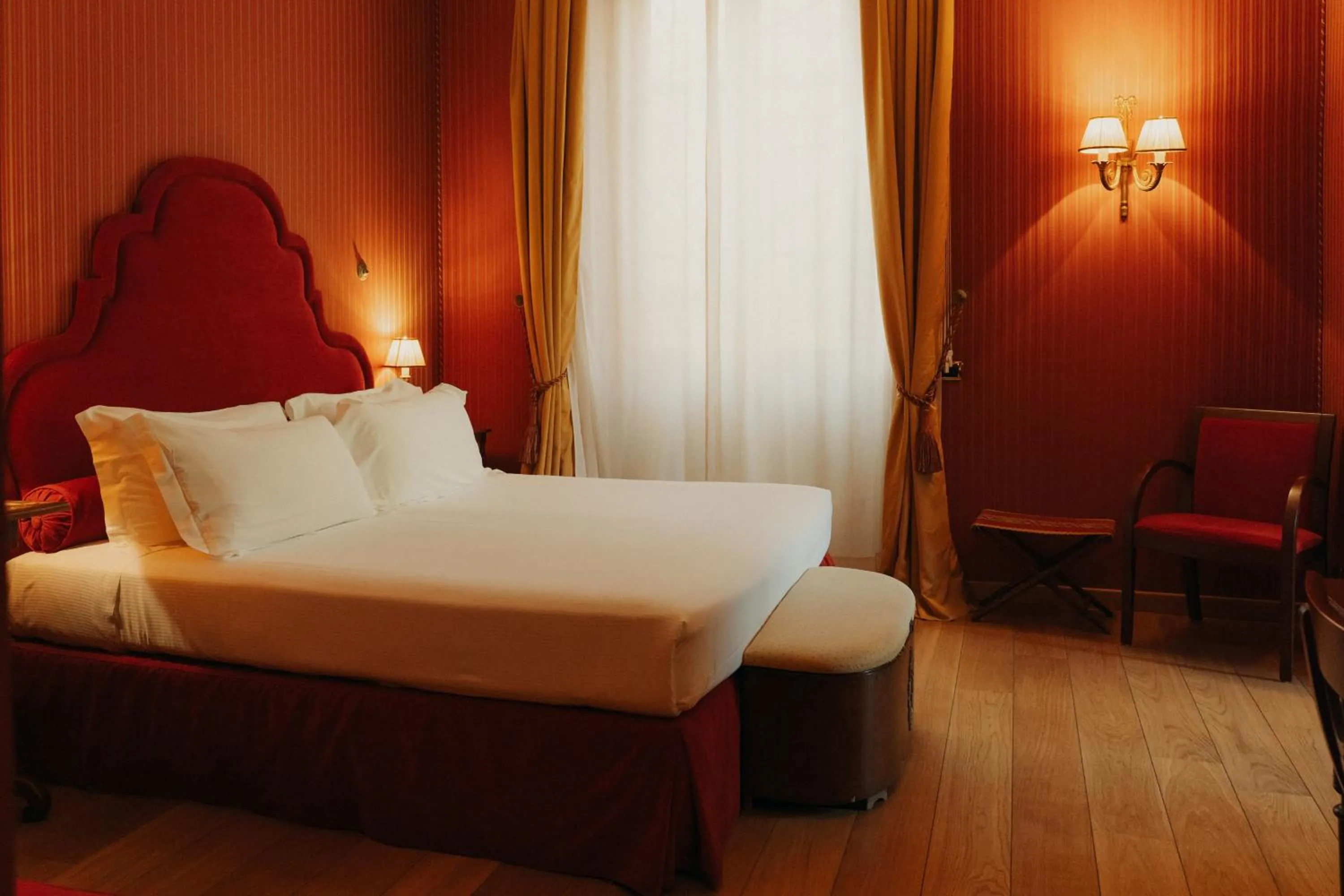 Bed in Hotel Palazzo Guiscardo Pietrasanta