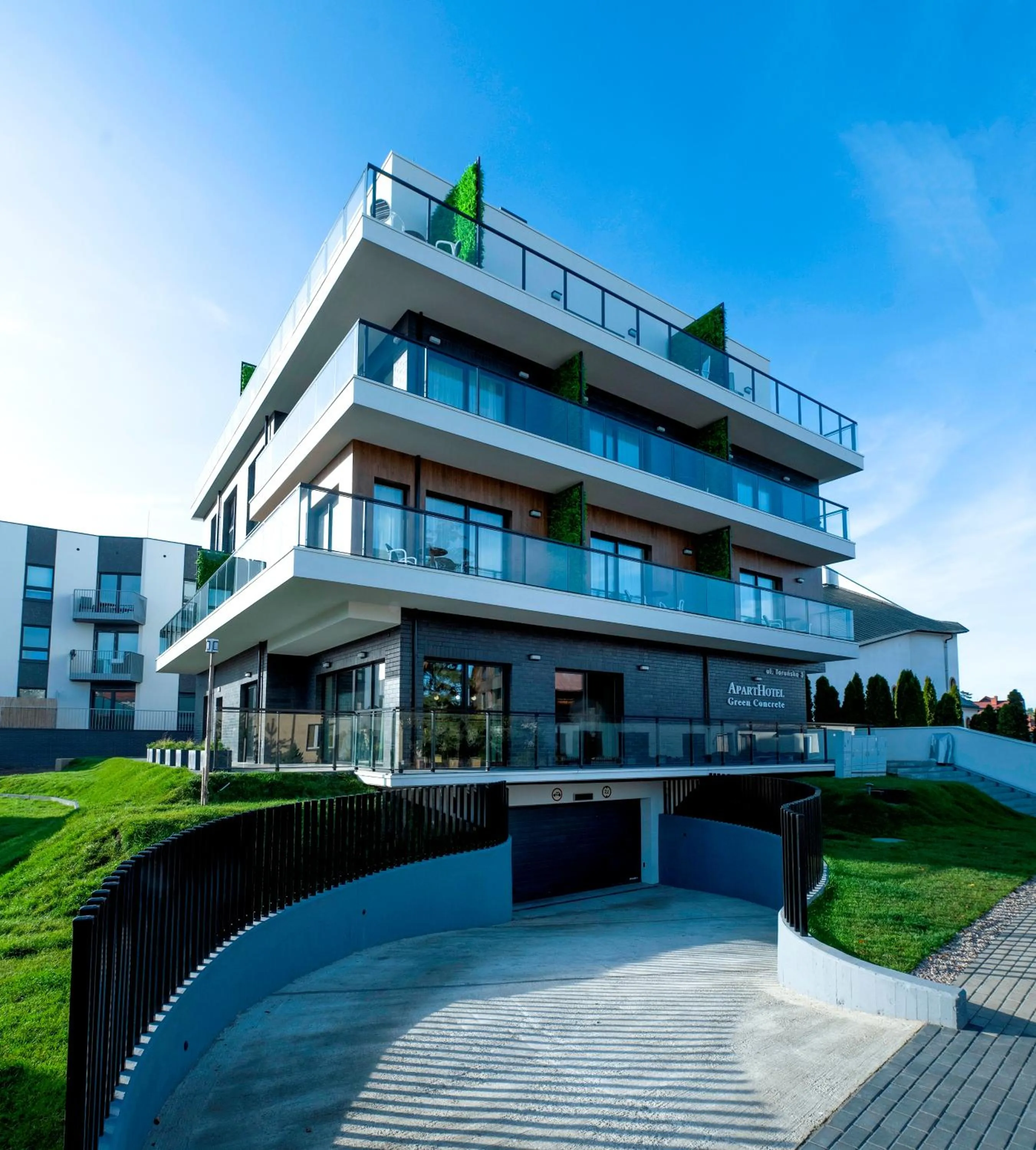 Property building in Aparthotel Green Concrete - ekologiczne apartamenty premium ze strefą Wellness