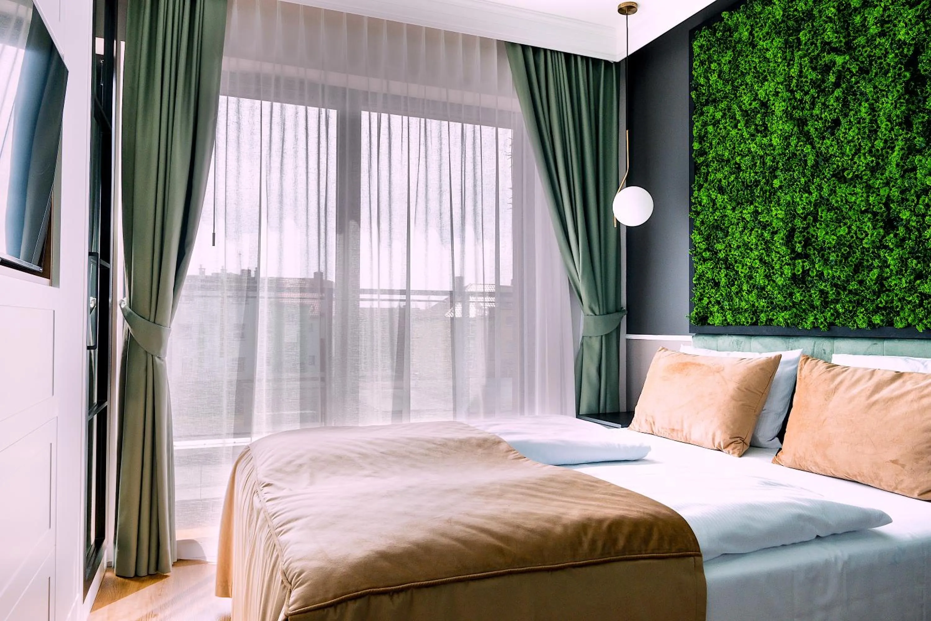 Bed in Aparthotel Green Concrete