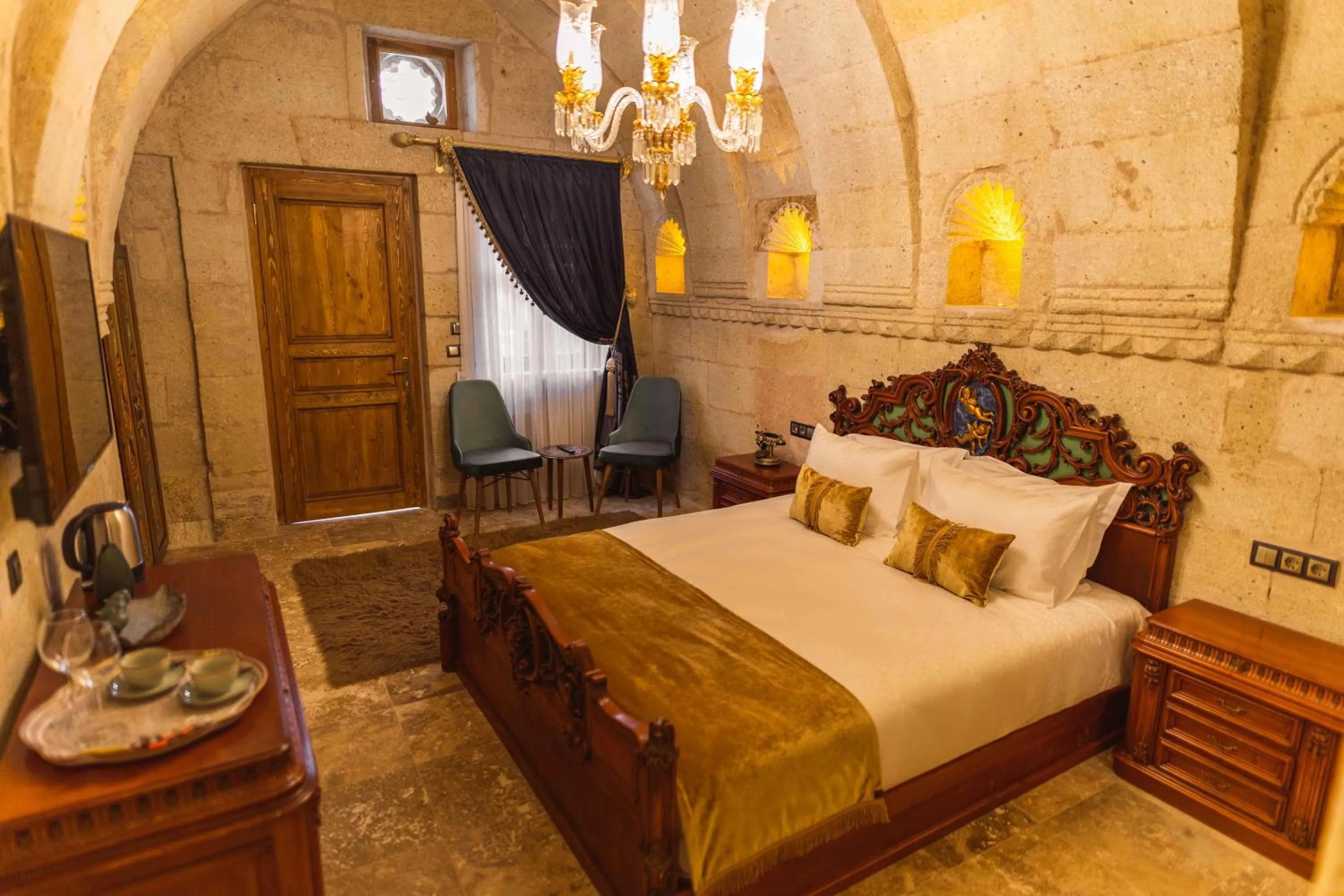 Bed in Solo Cave Suites