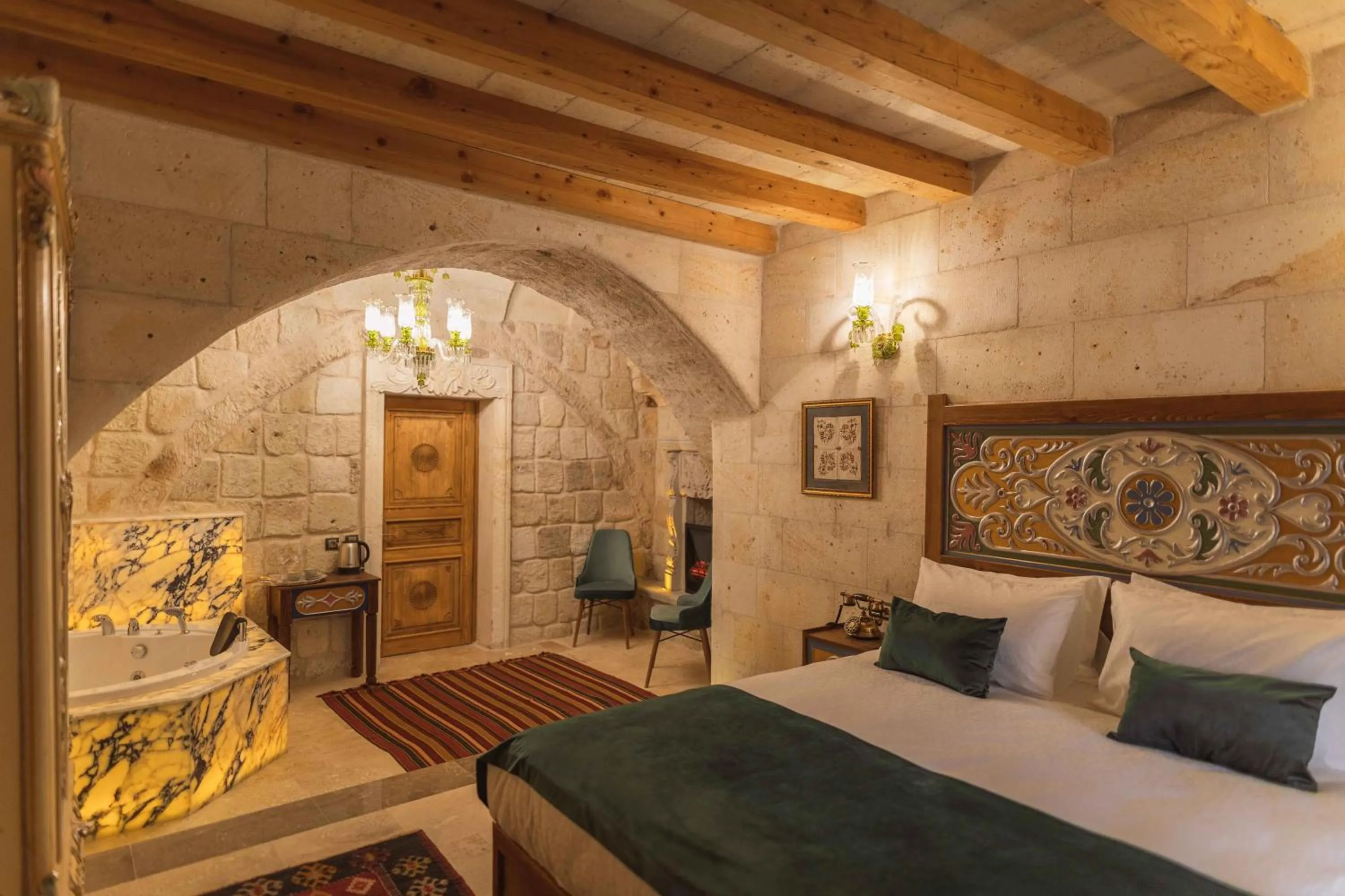 Bed in Solo Cave Suites