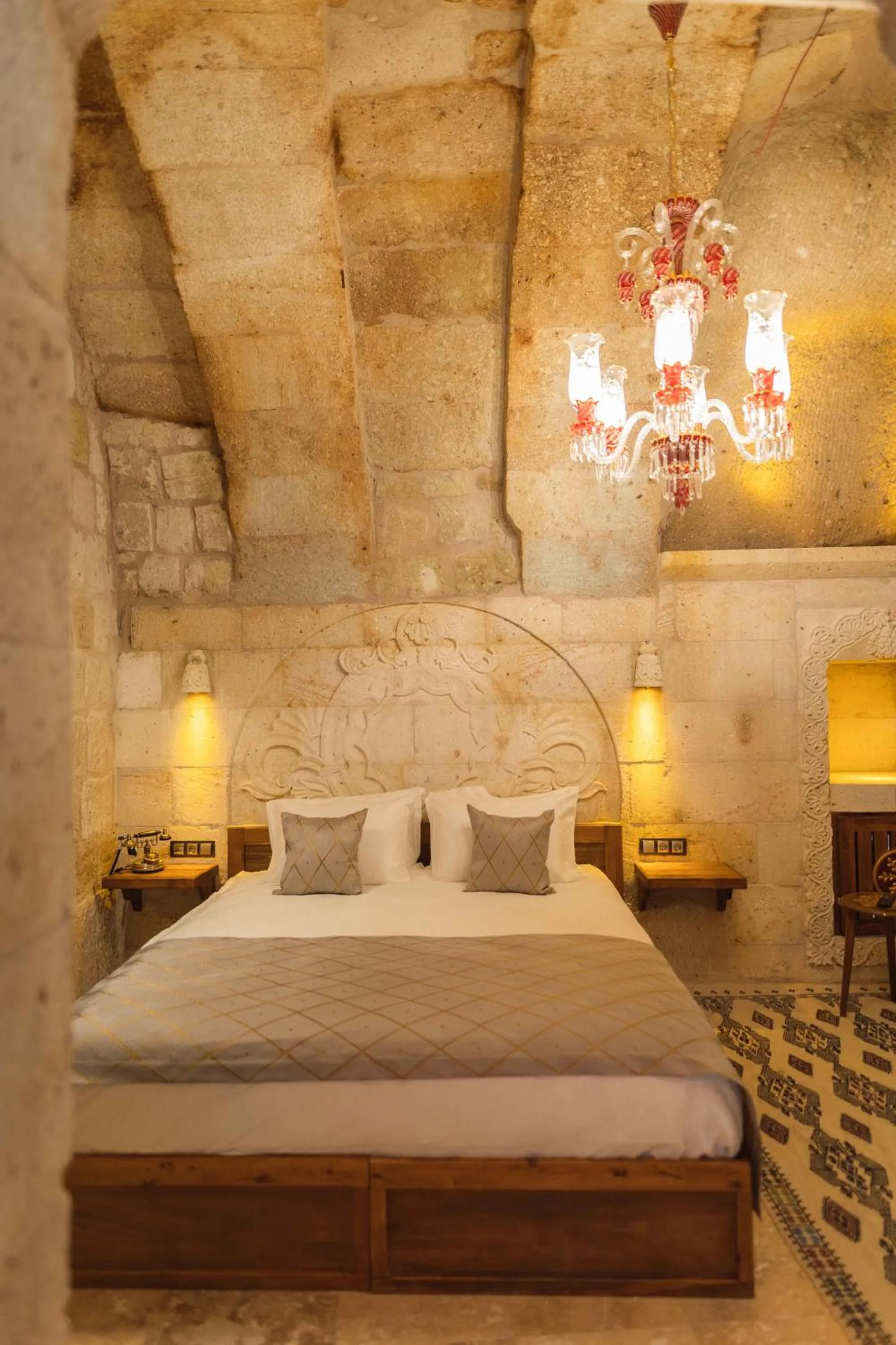 Bed in Solo Cave Suites