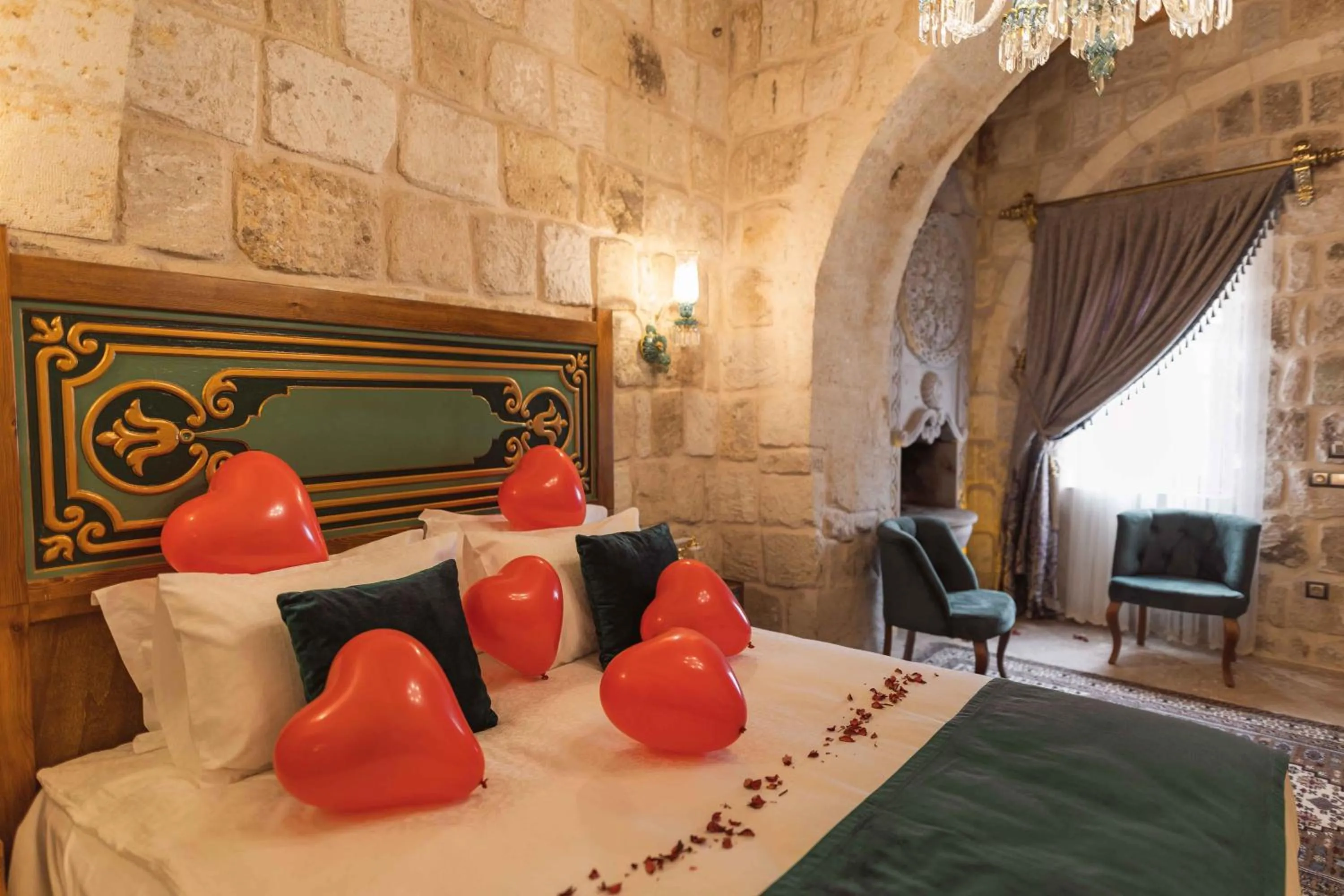 Bed in Solo Cave Suites