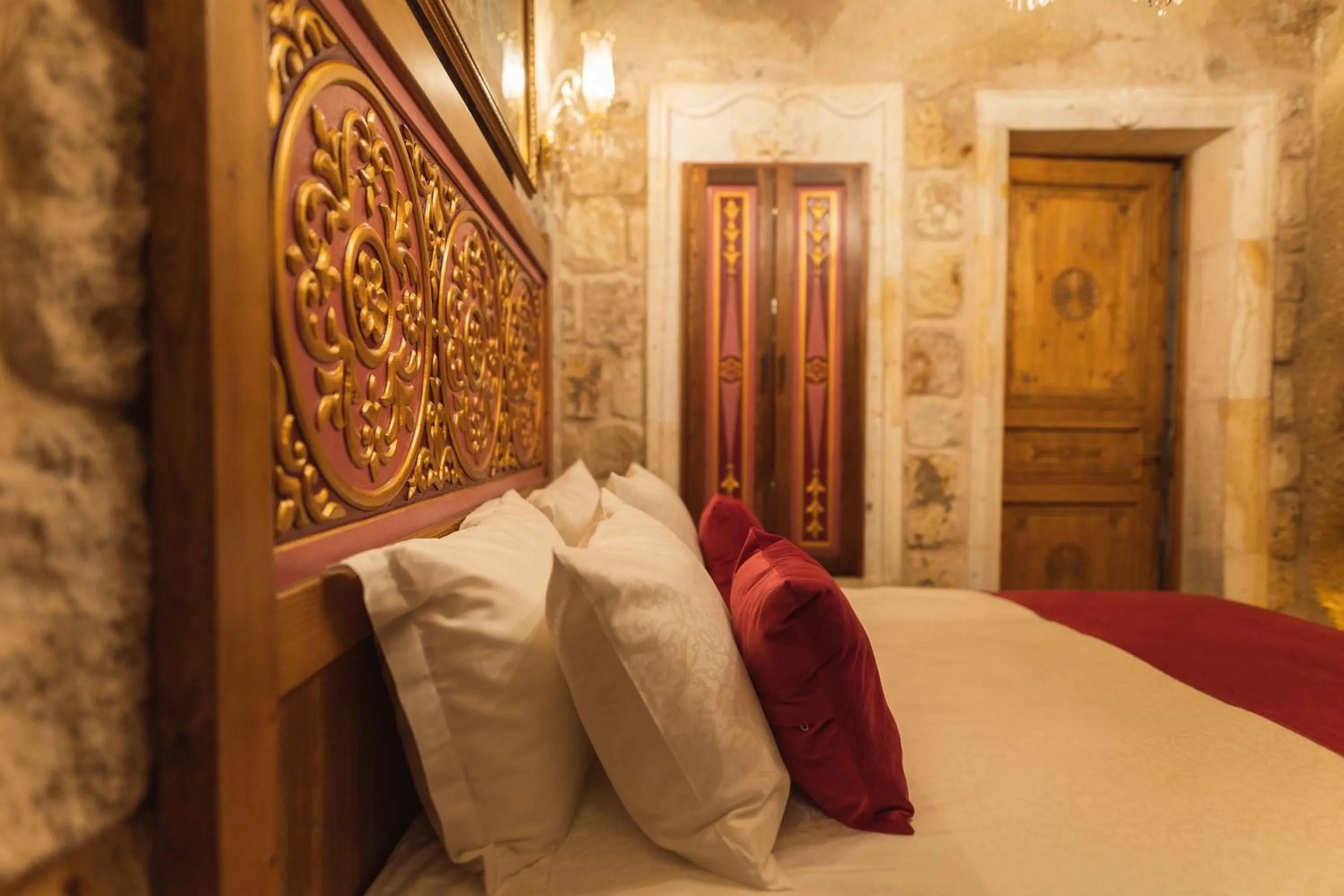 Bed in Solo Cave Suites