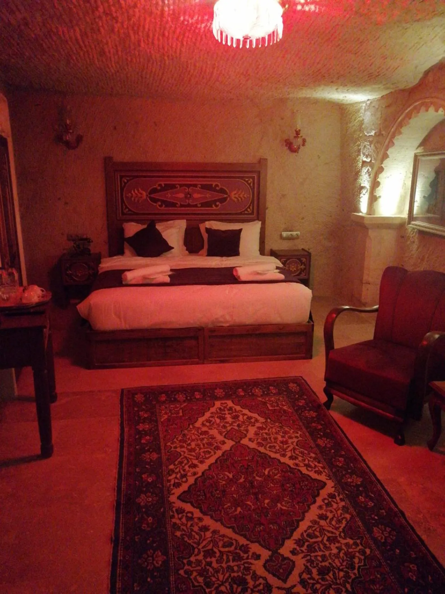 Bed in Solo Cave Suites