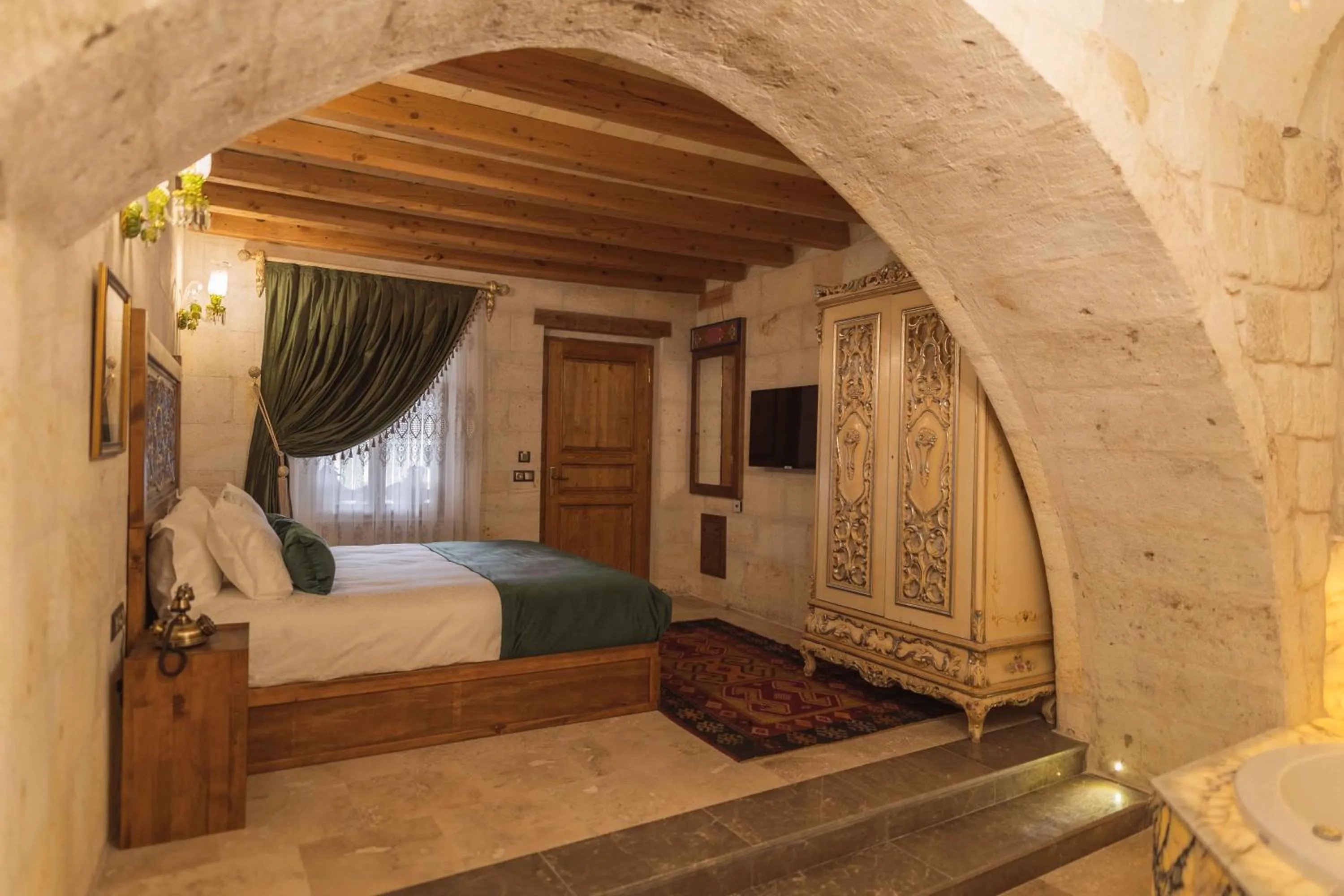 Bed in Solo Cave Suites
