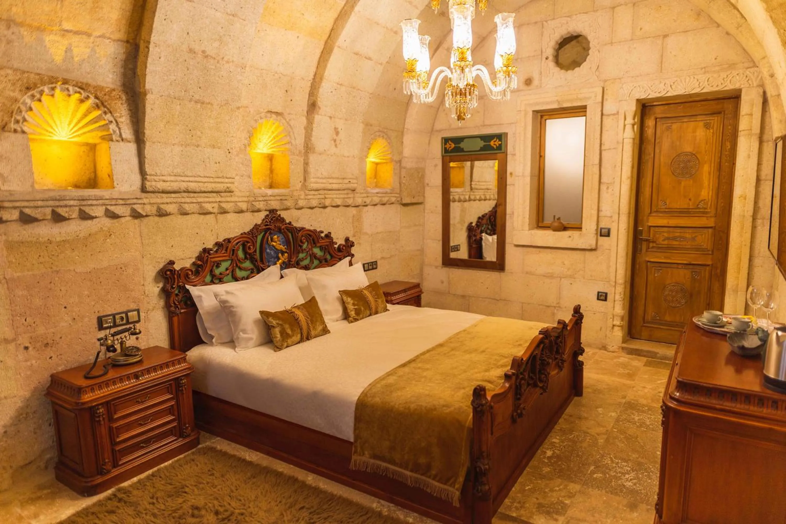 Bed in Solo Cave Suites