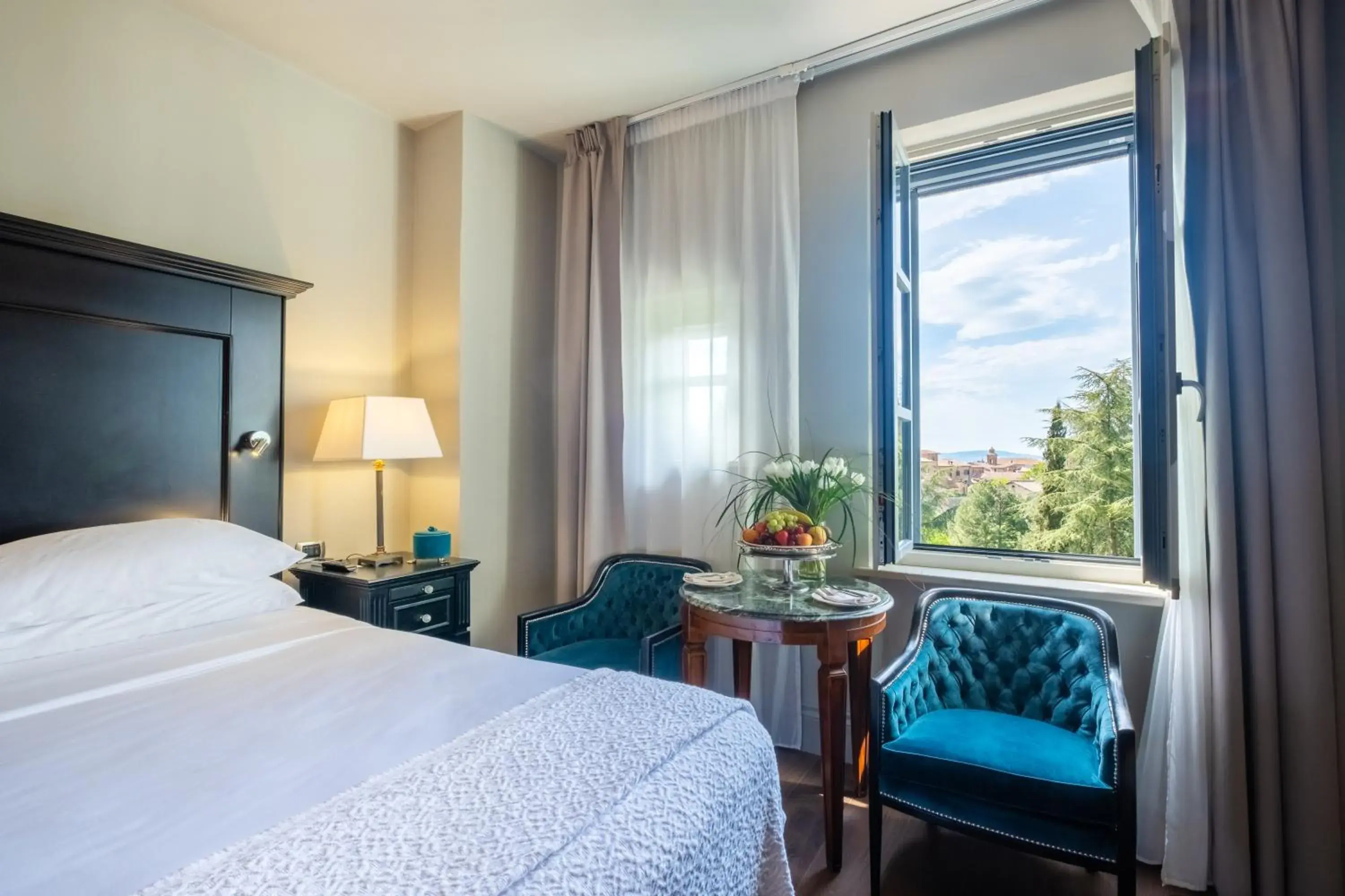 View (from property/room), Bed in Hotel Vannucci View (from property/room), Bed in Hotel Vannucci