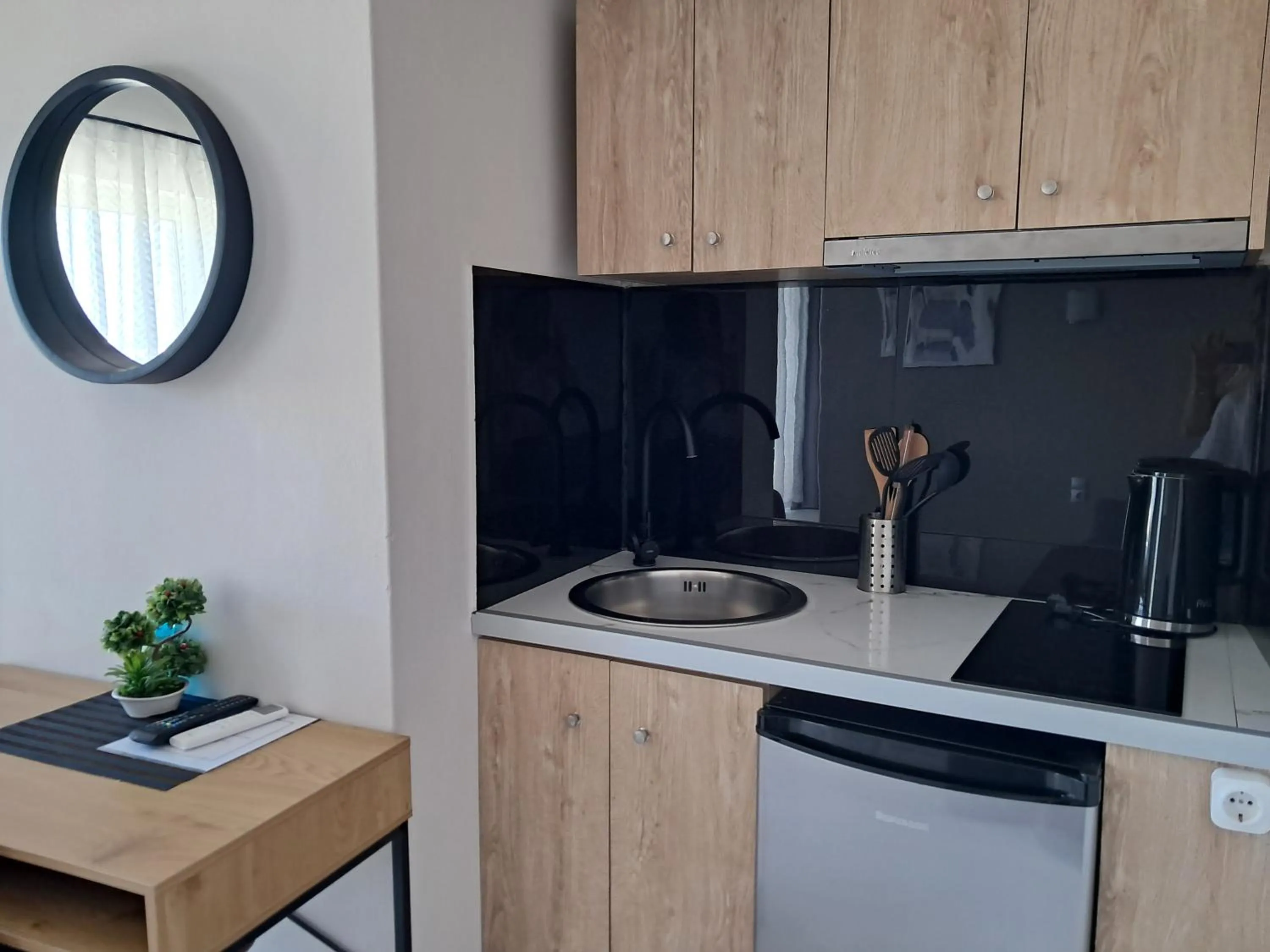 Kitchen or kitchenette in Secret Garden Hotel