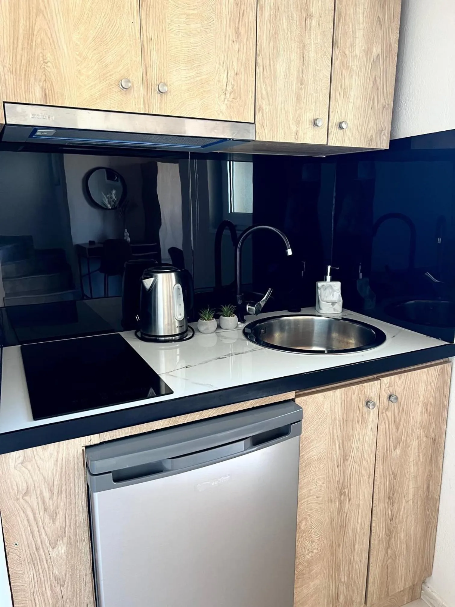 Kitchen or kitchenette in Secret Garden Hotel