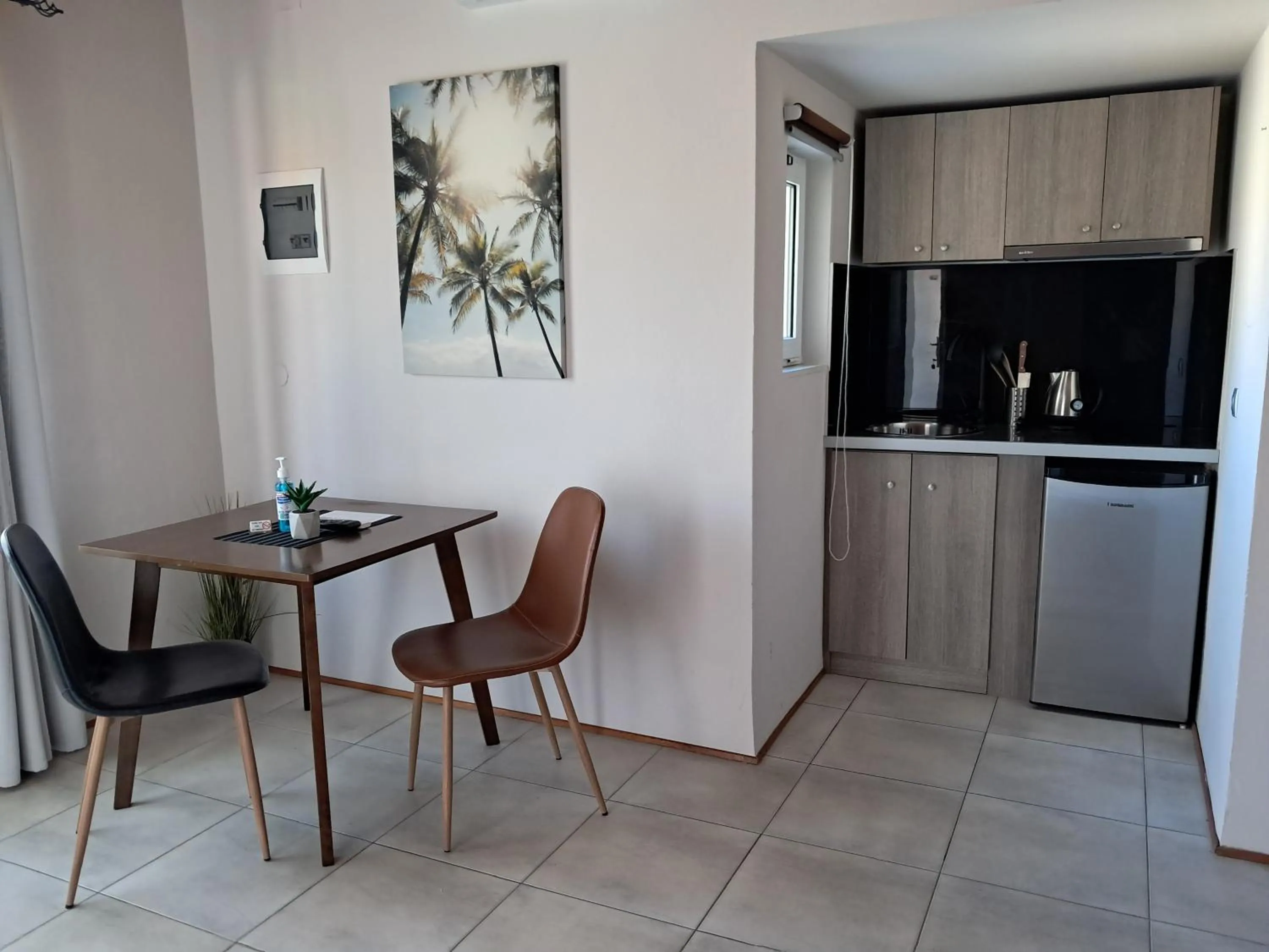 Kitchen or kitchenette in Secret Garden Hotel