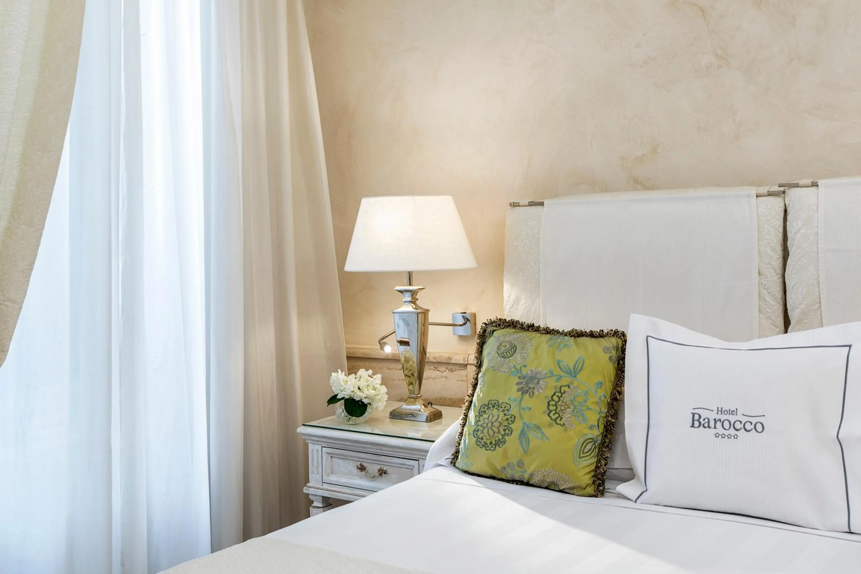 Bed in Hotel Barocco