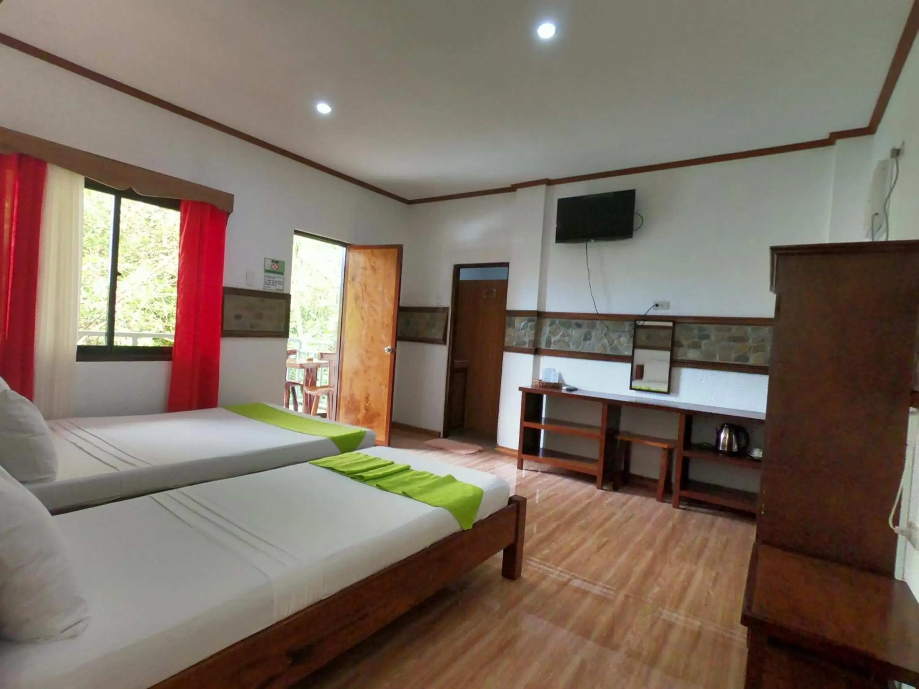 Photo of the whole room, Bed in El Nido Viewdeck Cottages Photo of the whole room, Bed in El Nido Viewdeck Cottages