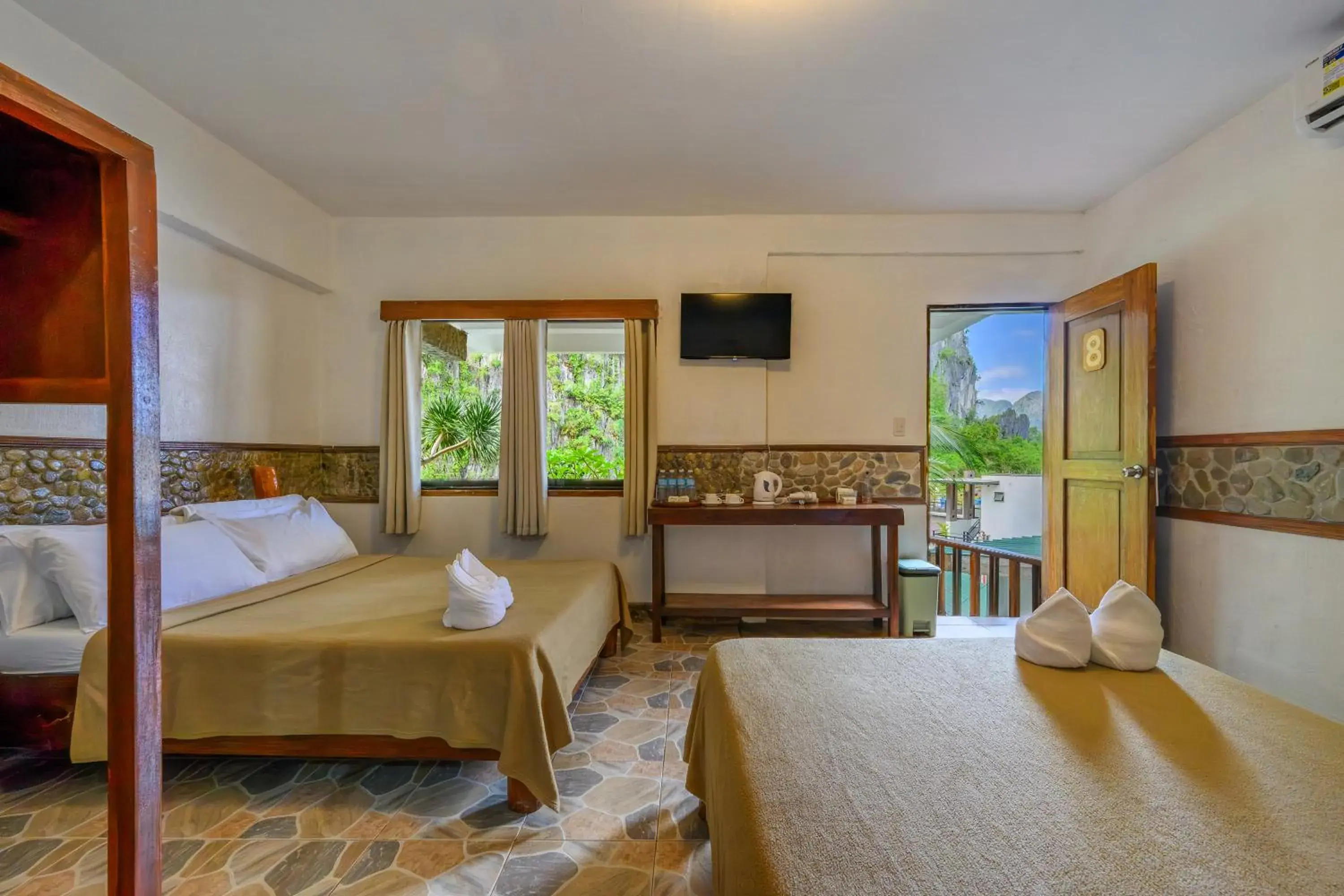 TV and multimedia, Bed in El Nido Viewdeck Cottages TV and multimedia, Bed in El Nido Viewdeck Cottages