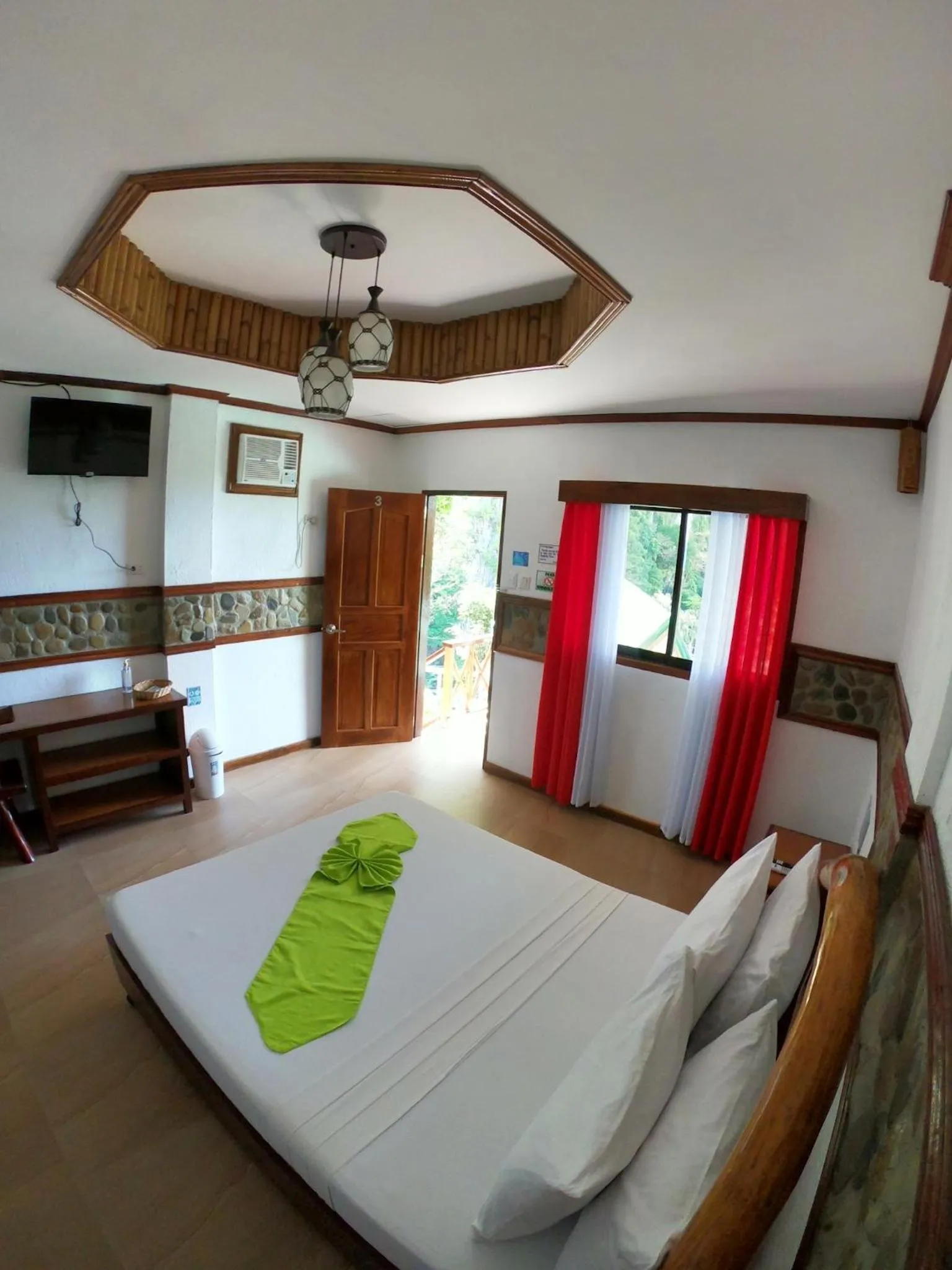 Bed in El Nido Viewdeck Cottages