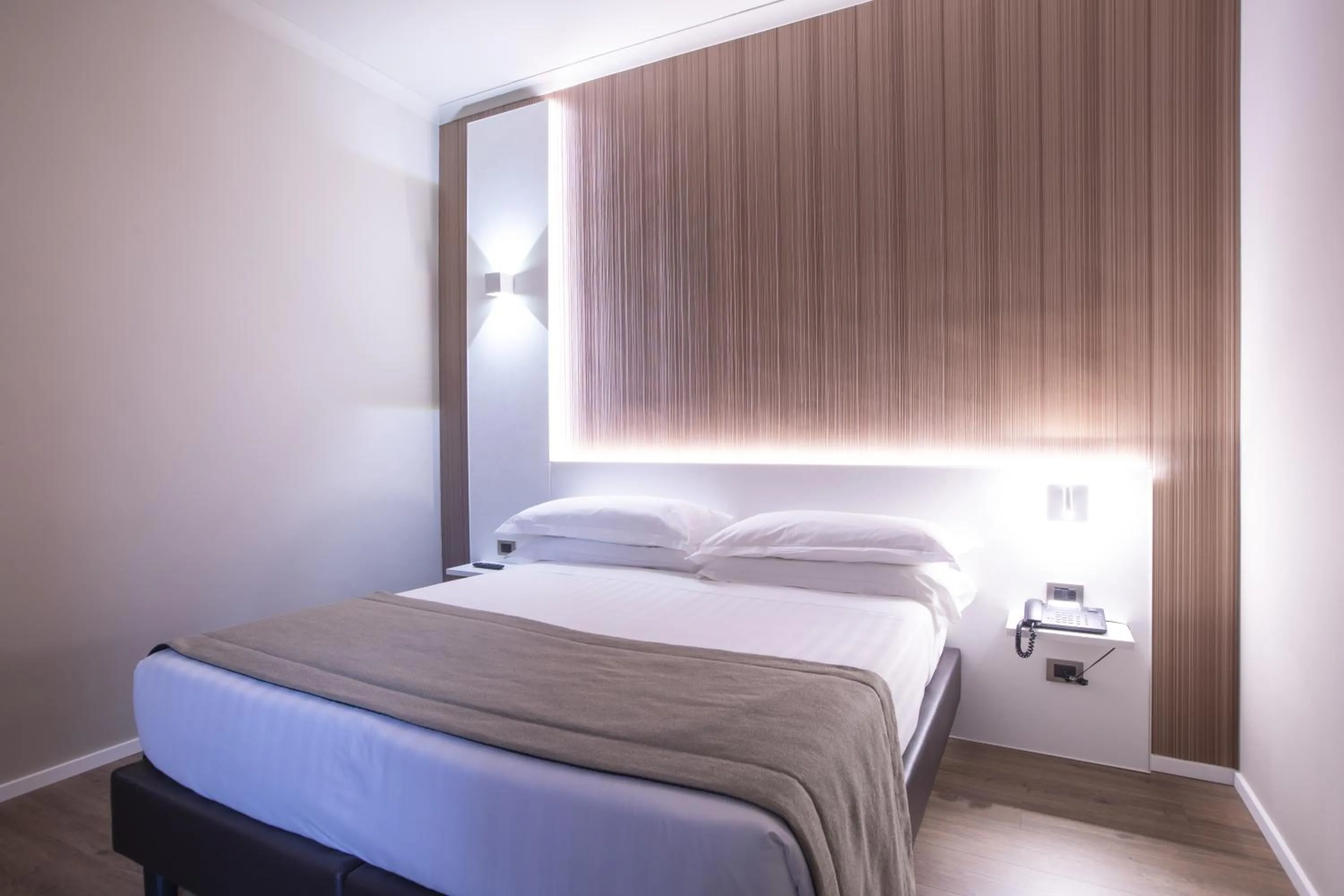 Bed in Garner Hotel Rome Aurelia by IHG