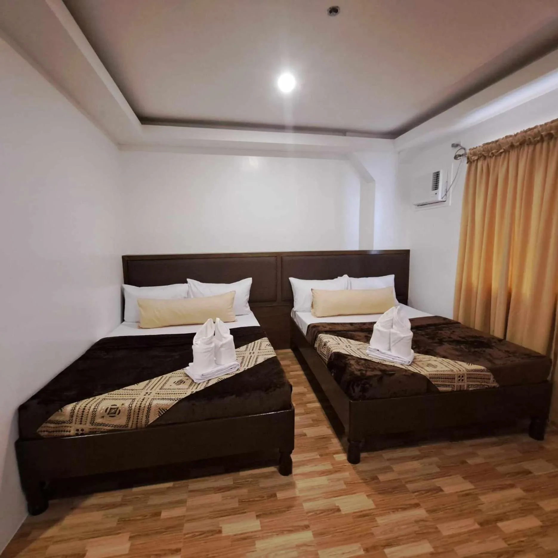 Bed in Jurias Garden Hotel