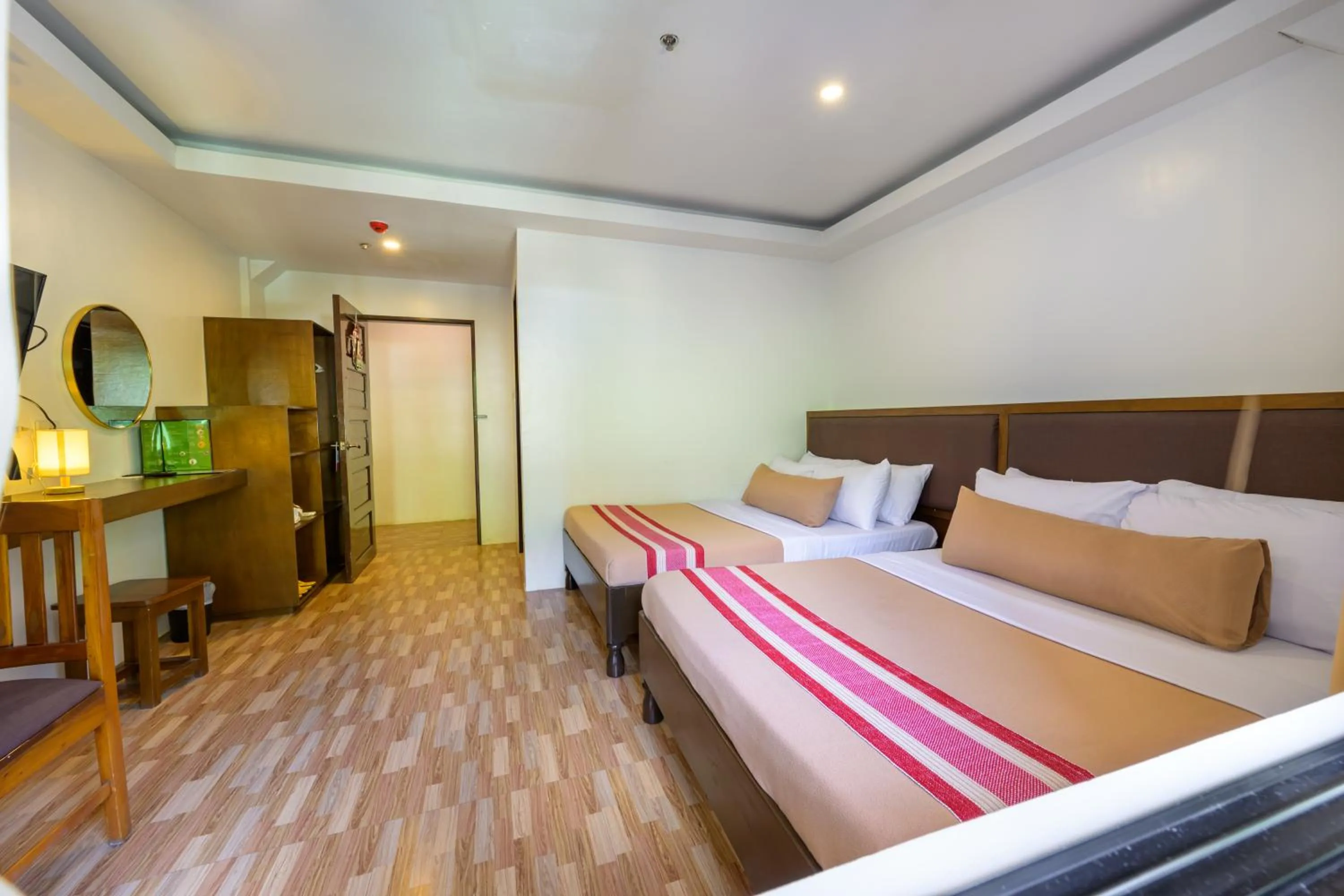 Bed in Jurias Garden Hotel