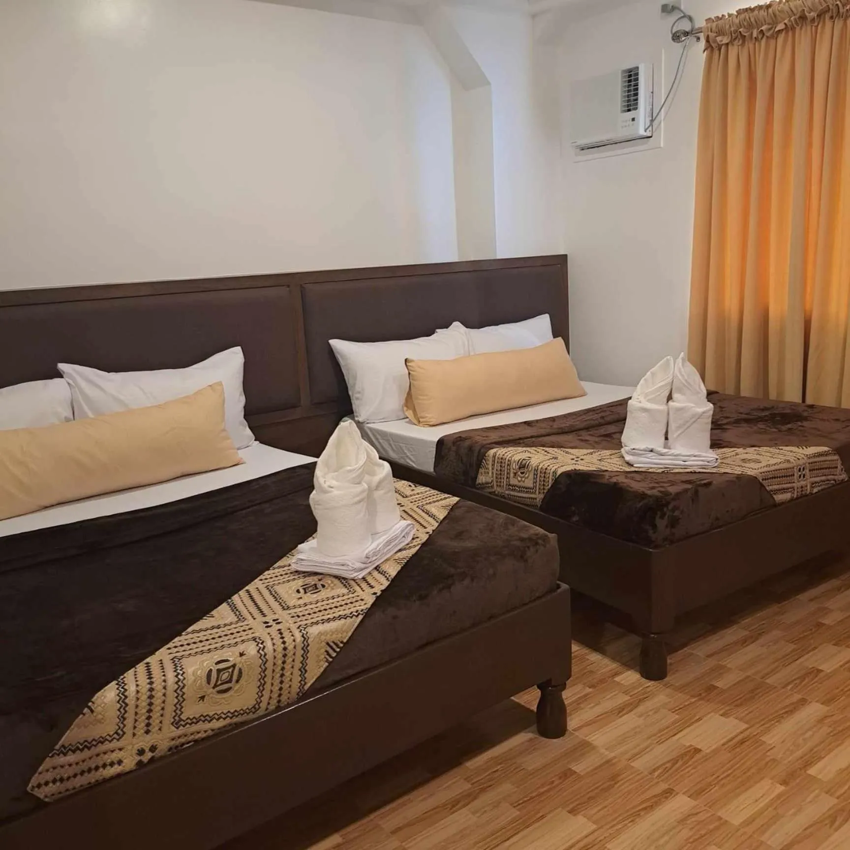 Bed in Jurias Garden Hotel