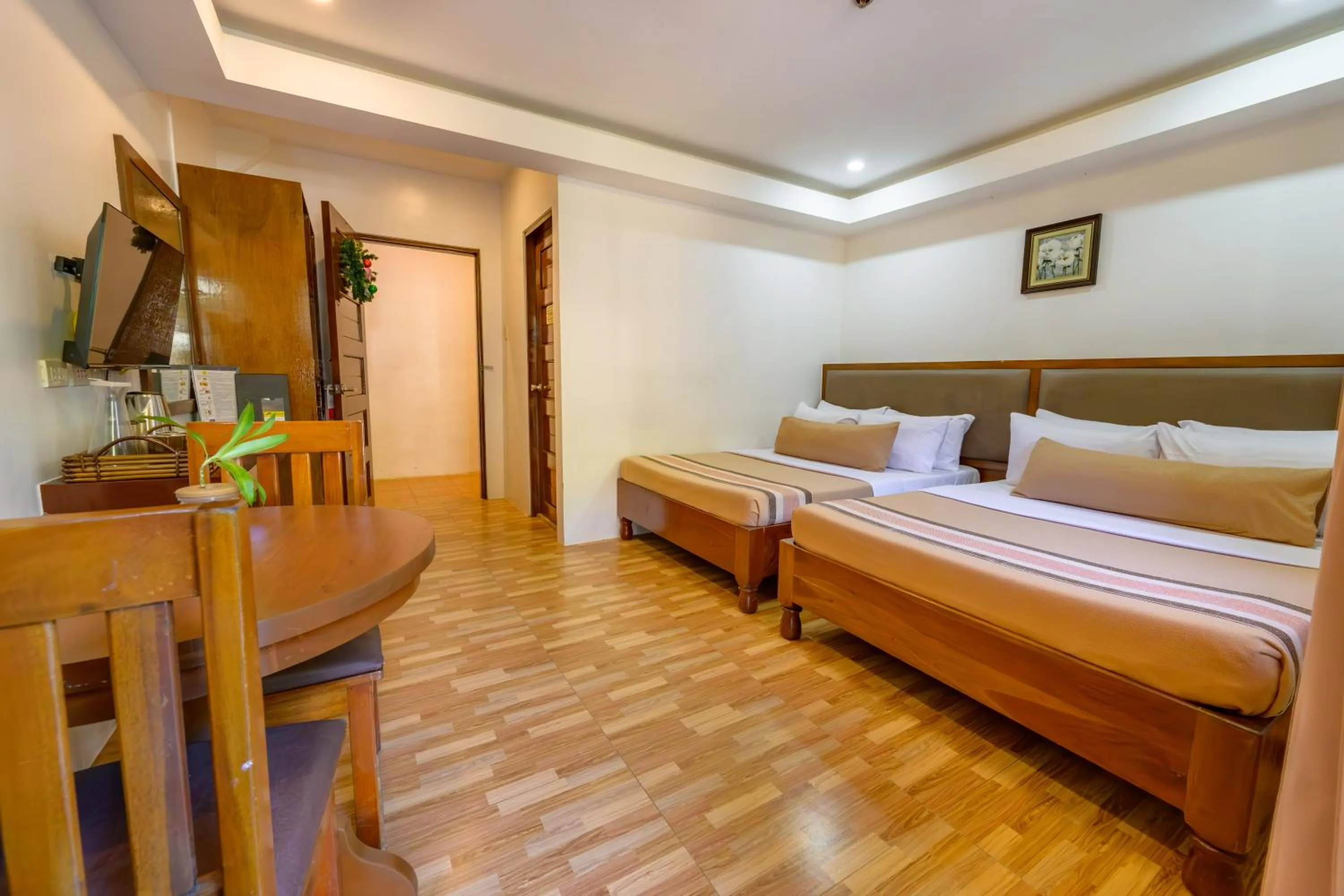 Bed in Jurias Garden Hotel