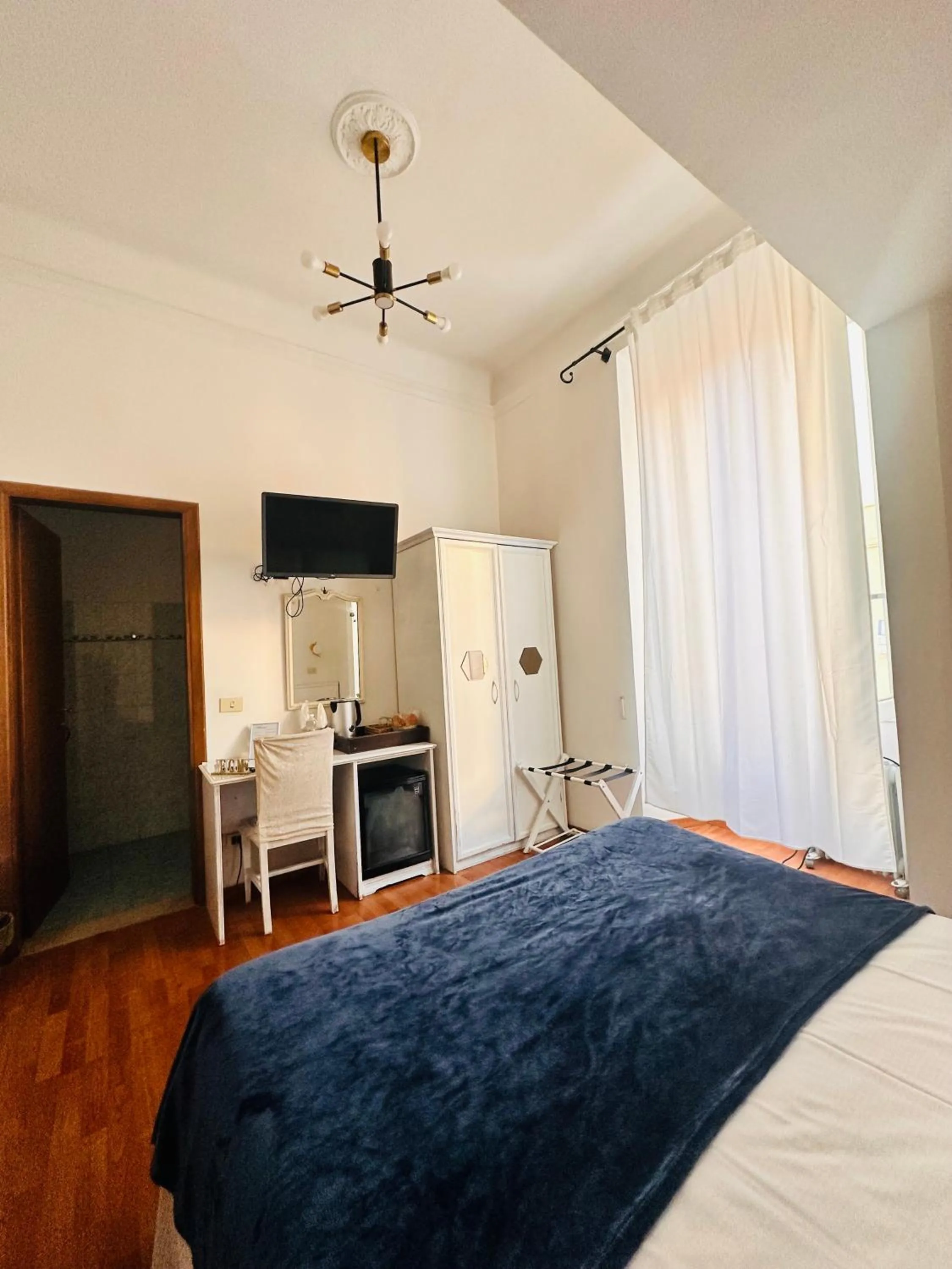 Photo of the whole room, Bed in Soggiorno Madrid