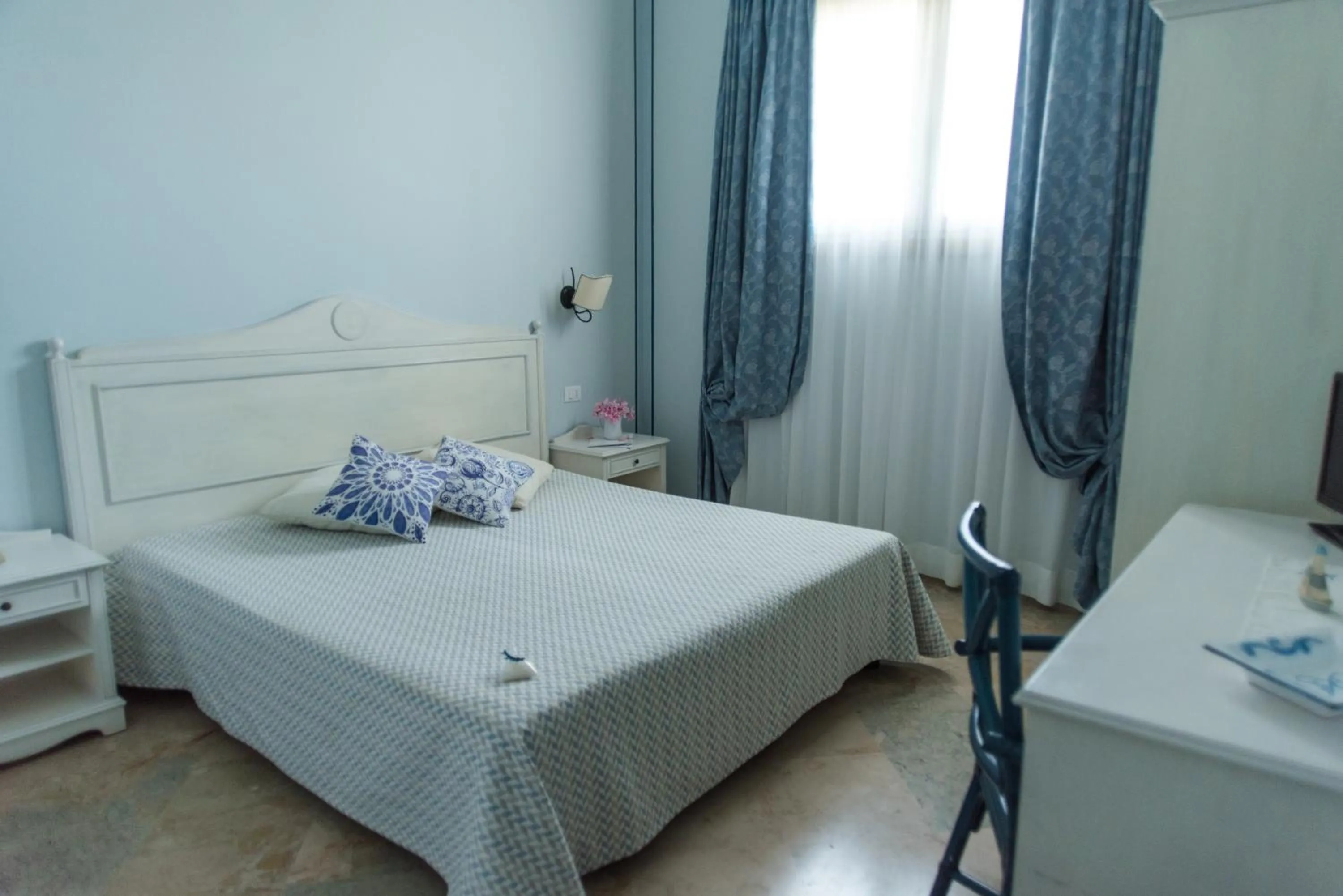 Bed in Relais Antiche Saline