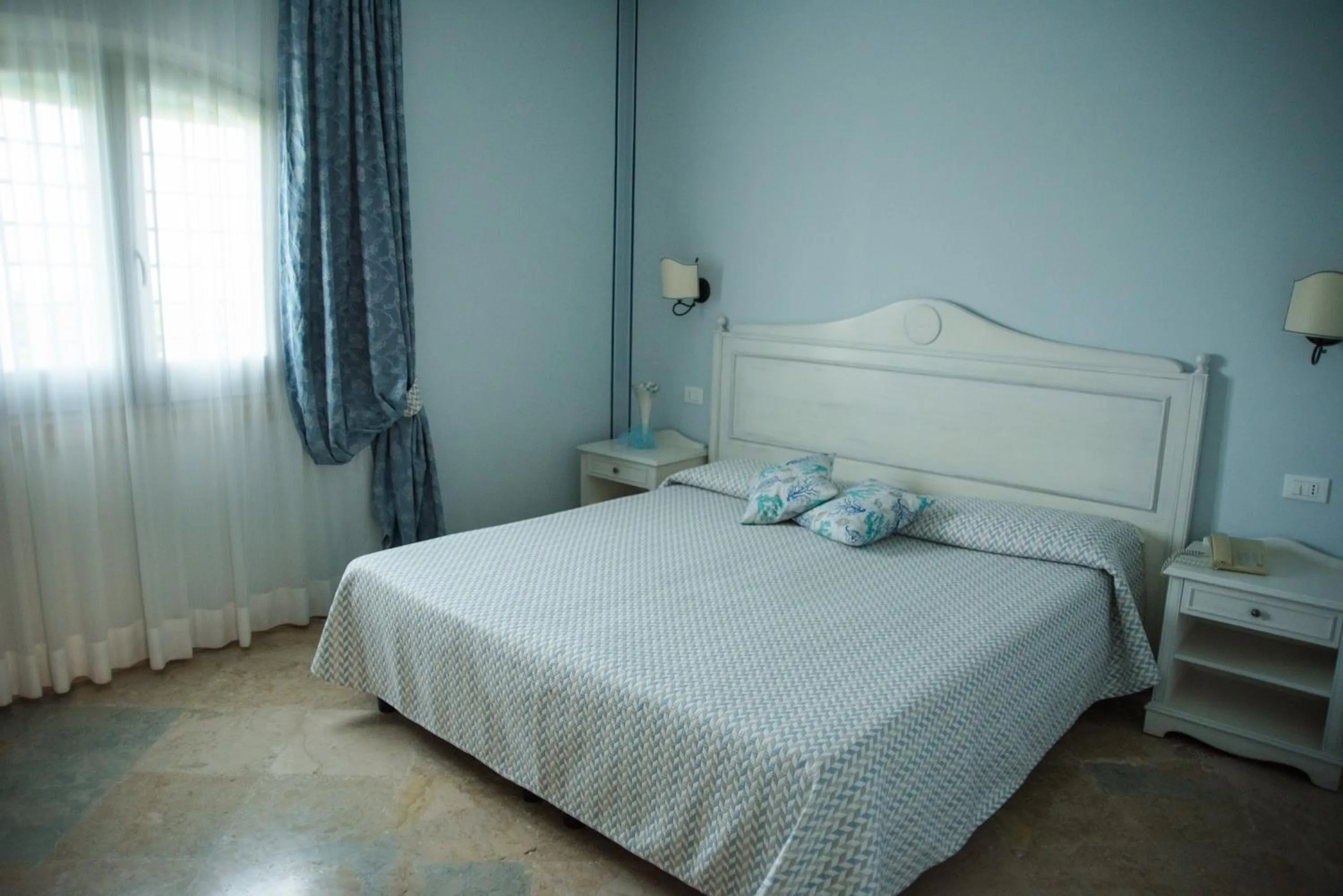 Bed in Relais Antiche Saline