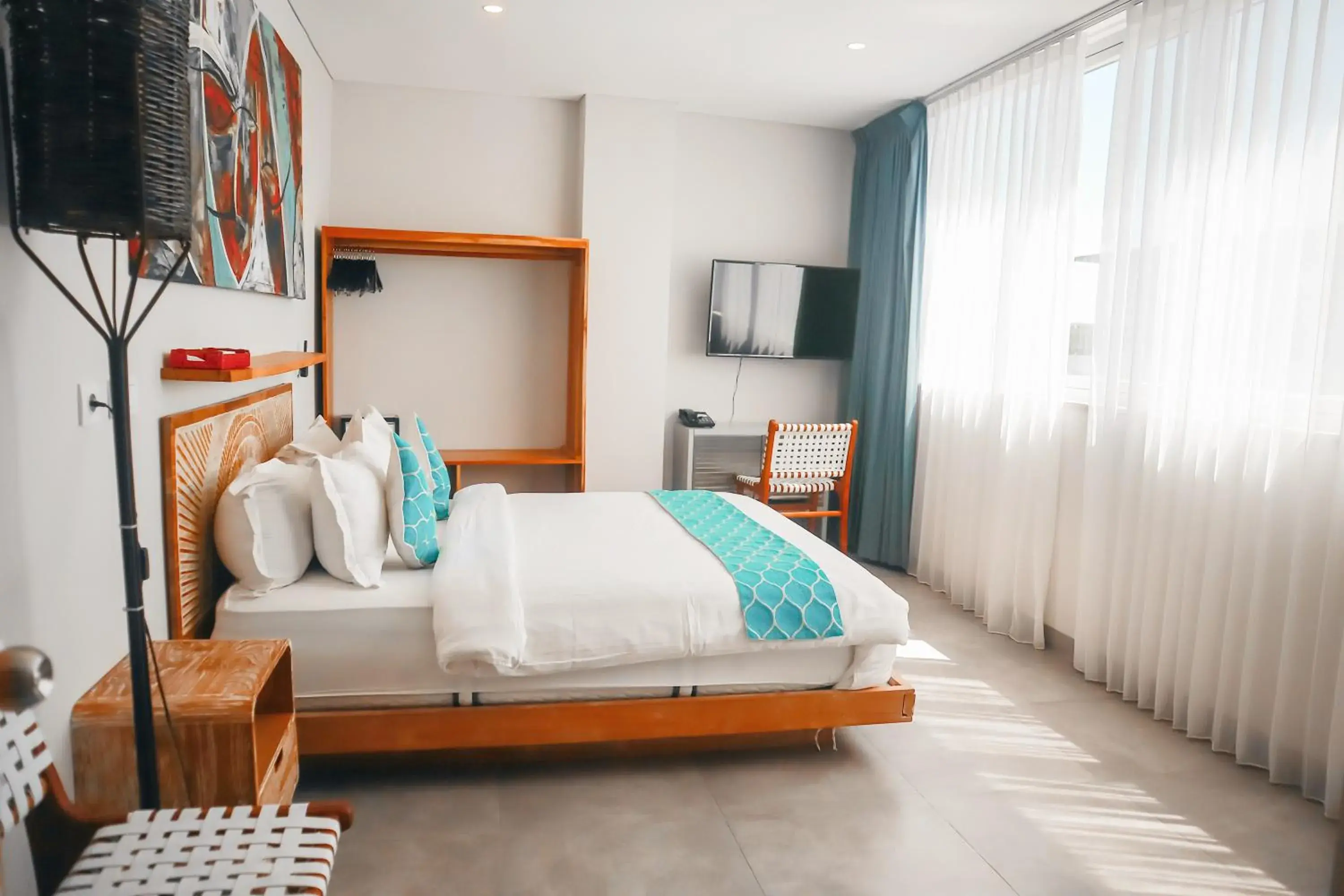 Communal lounge/ TV room, Bed in Harbour Komodo Hotel Communal lounge/ TV room, Bed in Harbour Komodo Hotel