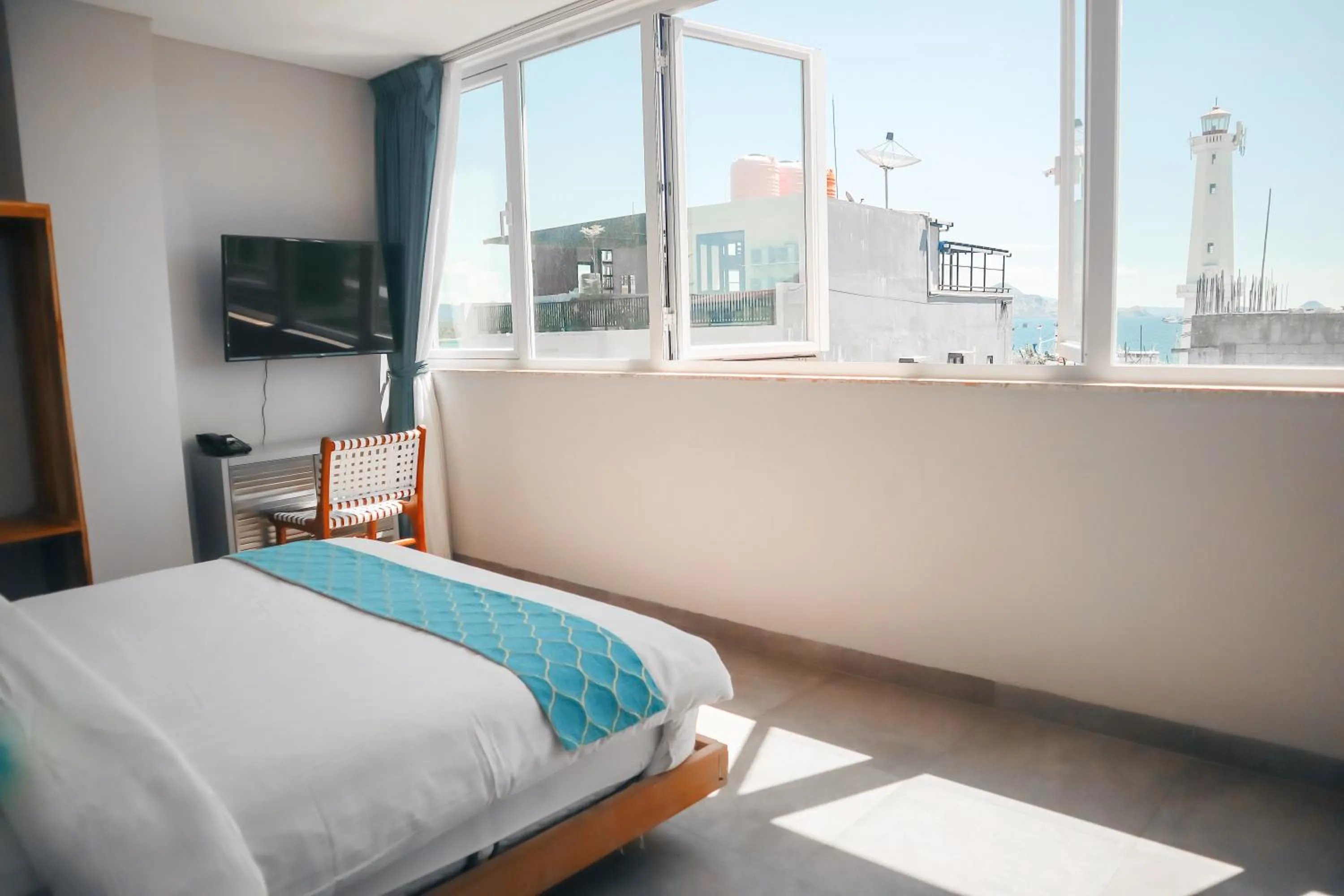 View (from property/room), Bed in Harbour Komodo Hotel