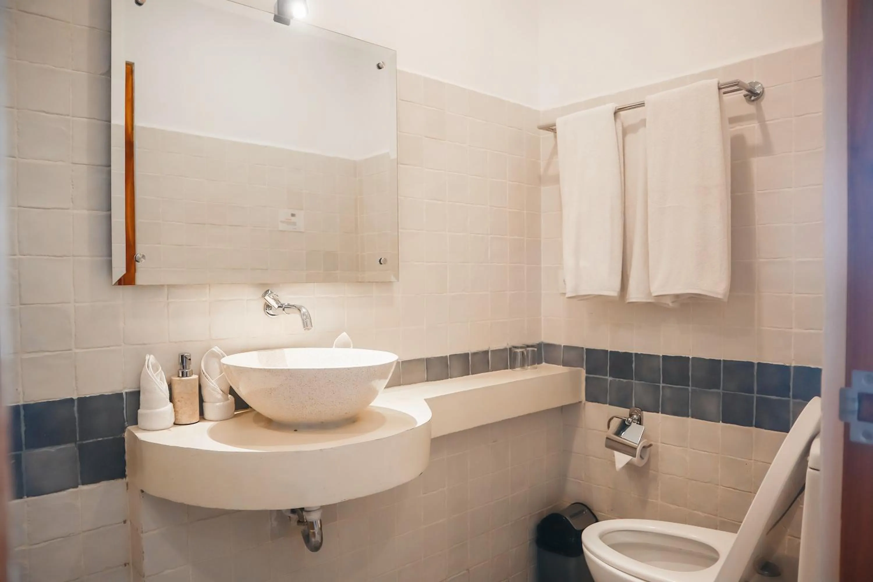 Toilet in Harbour Komodo Hotel