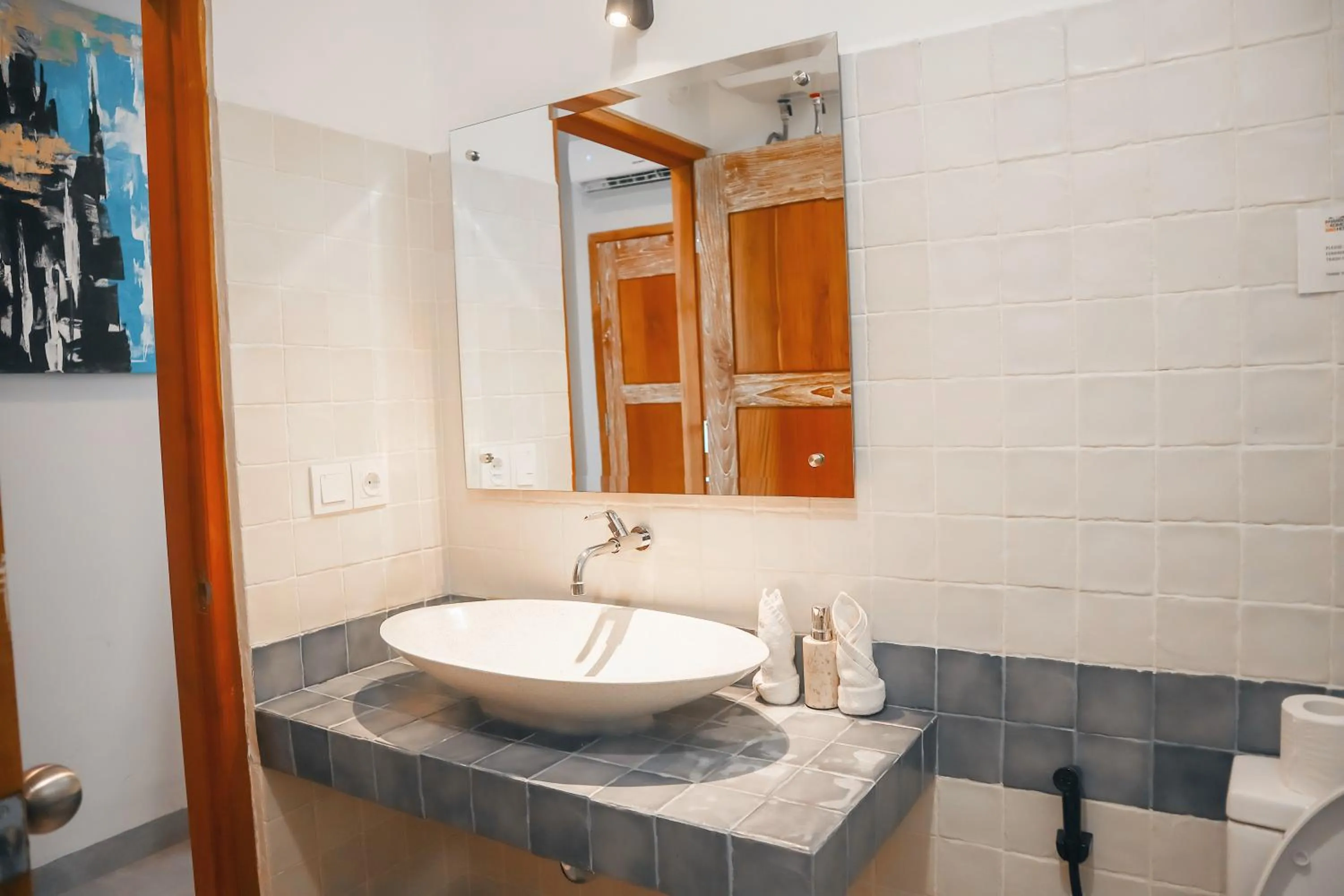 Bathroom in Harbour Komodo Hotel