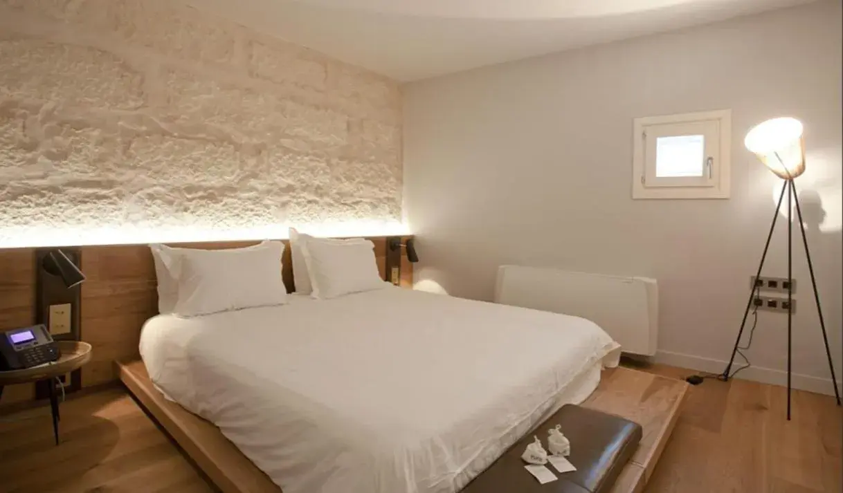 Bed in Puro Grand Hotel Bed in Puro Grand Hotel