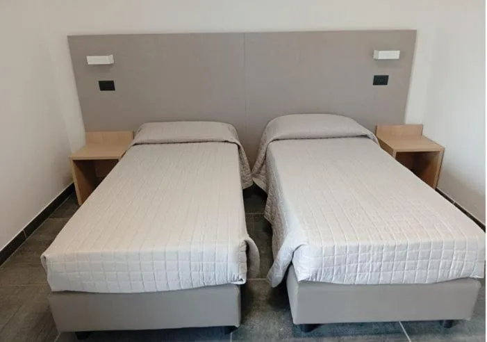 Photo of the whole room, Bed in Tiby Hotel