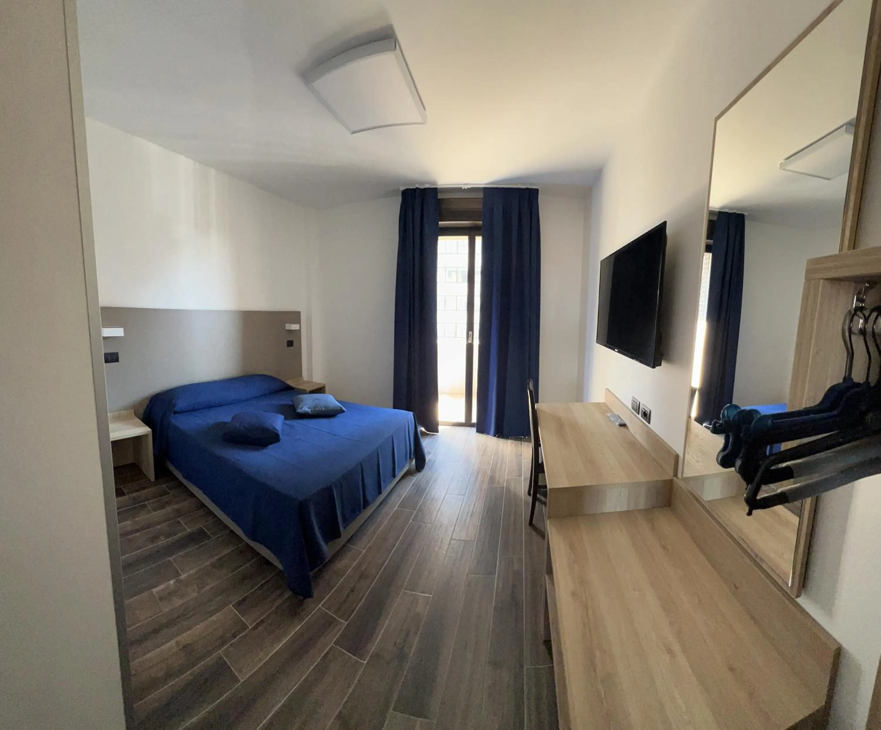 Photo of the whole room, Bed in Tiby Hotel