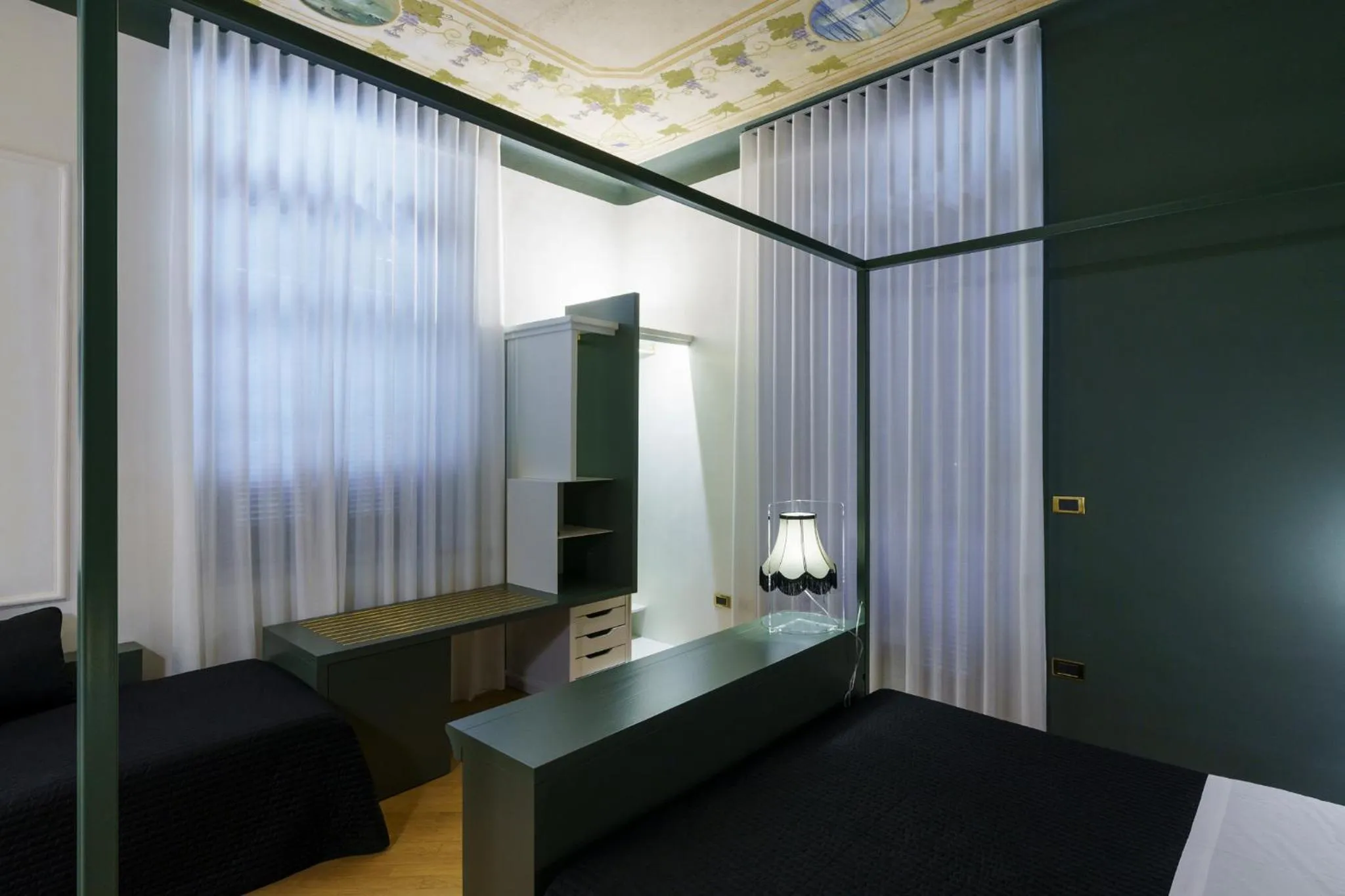 Bed in Villa Raffaello Park Hotel