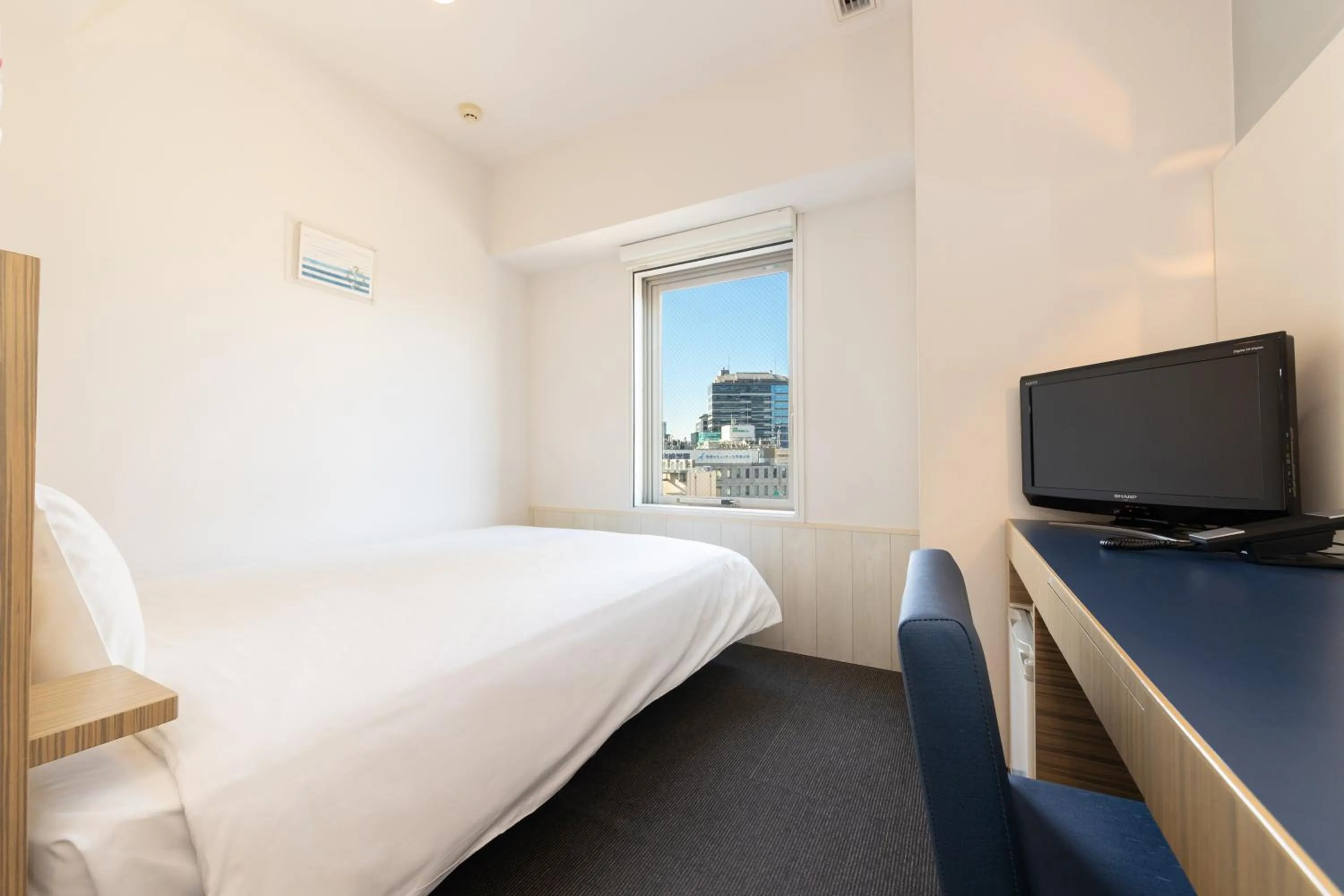 Photo of the whole room, TV/Entertainment Center in KEIKYU EX INN Yokohama-Station East -Yokohama Water front