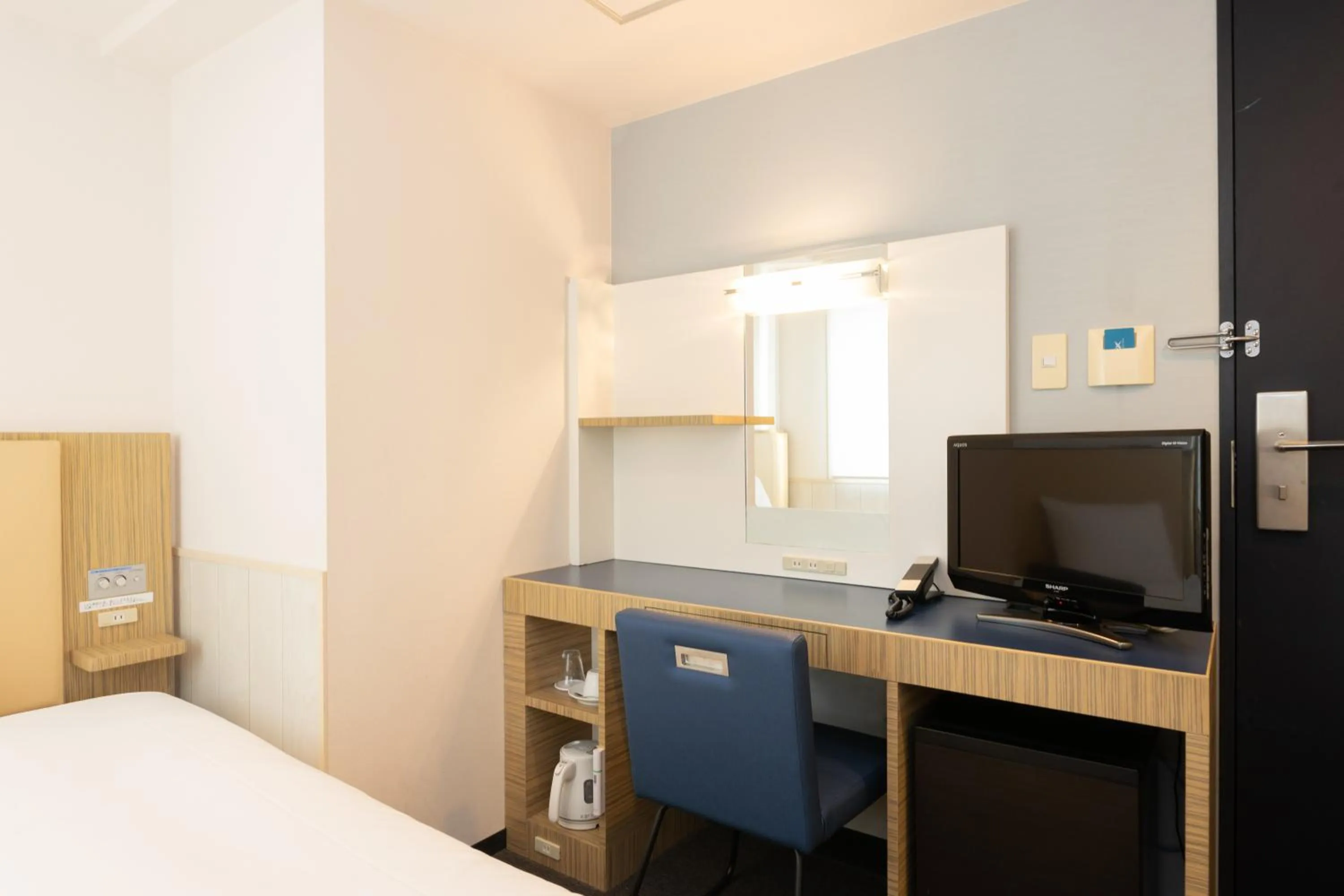 Photo of the whole room, TV/Entertainment Center in KEIKYU EX INN Yokohama-Station East -Yokohama Water front