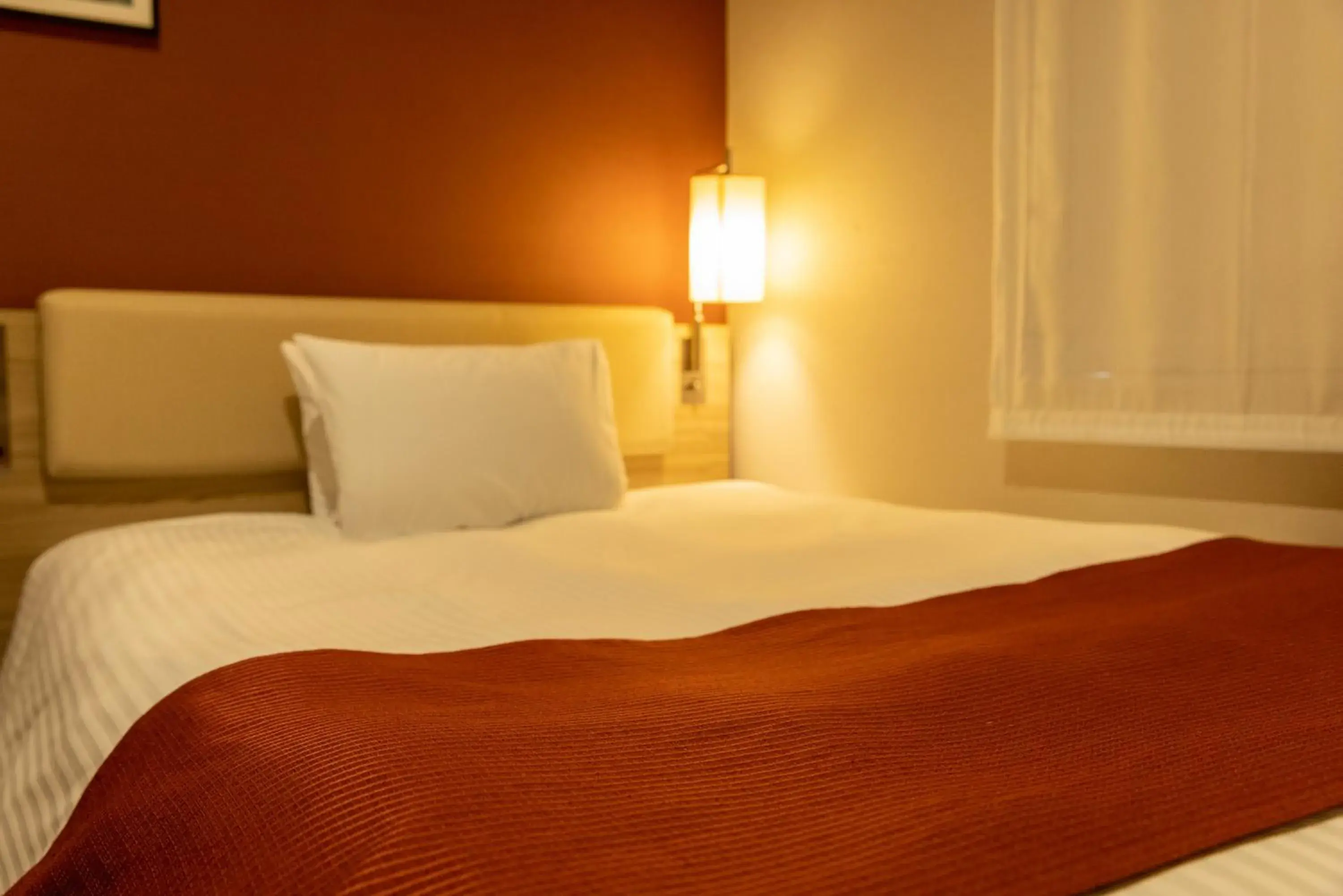 Bed in KEIKYU EX INN Keikyu Kawasaki-Station Bed in KEIKYU EX INN Keikyu Kawasaki-Station