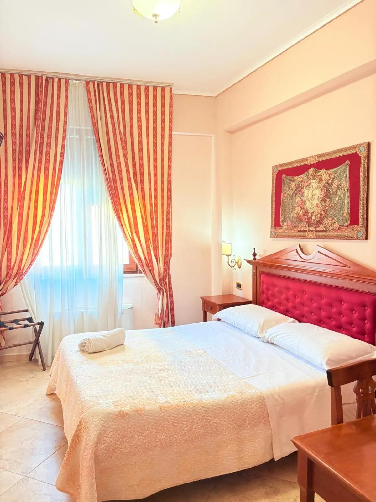 Bed in D'Angelo Palace Hotel