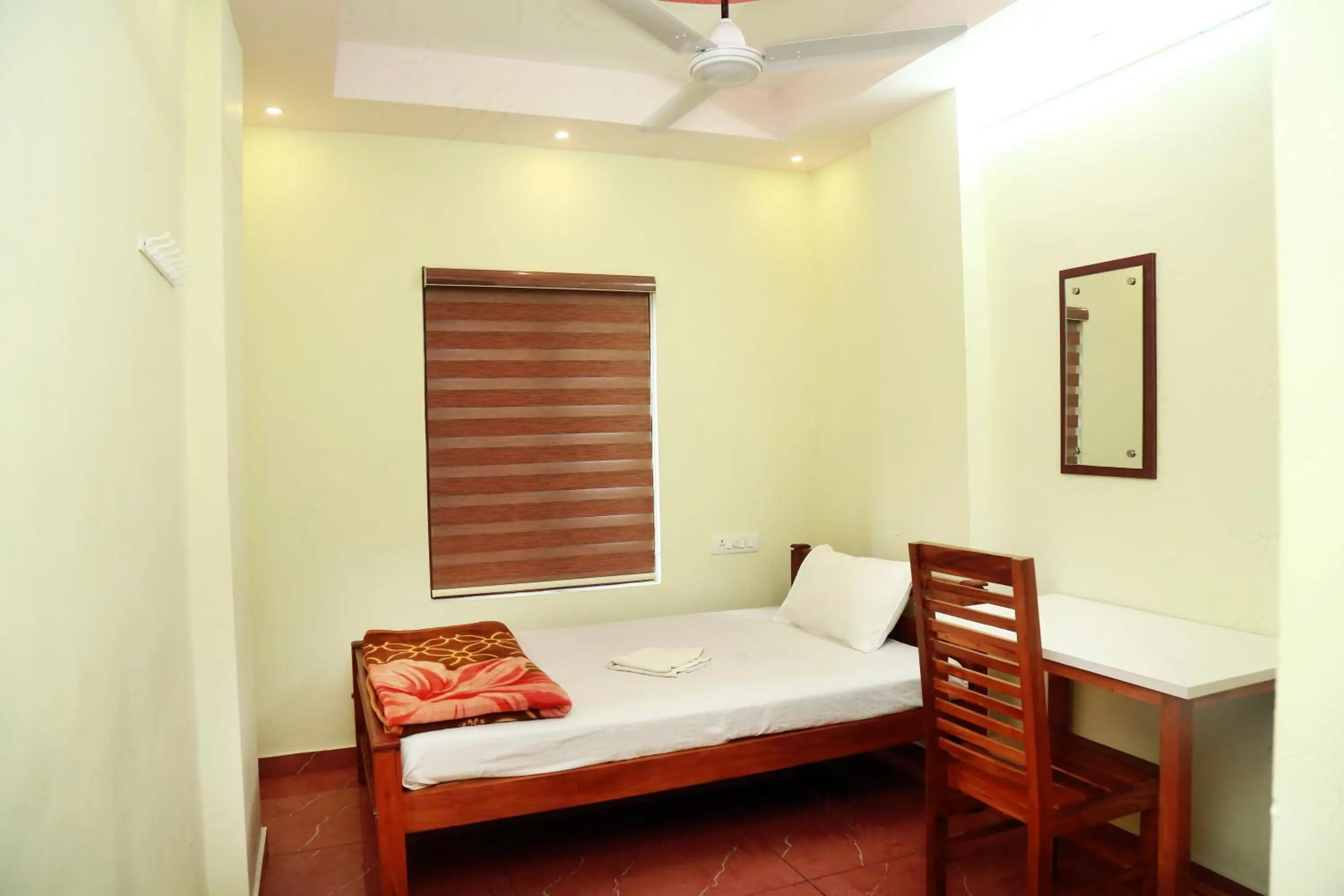 Photo of the whole room, Bed in MIST RESIDENCY