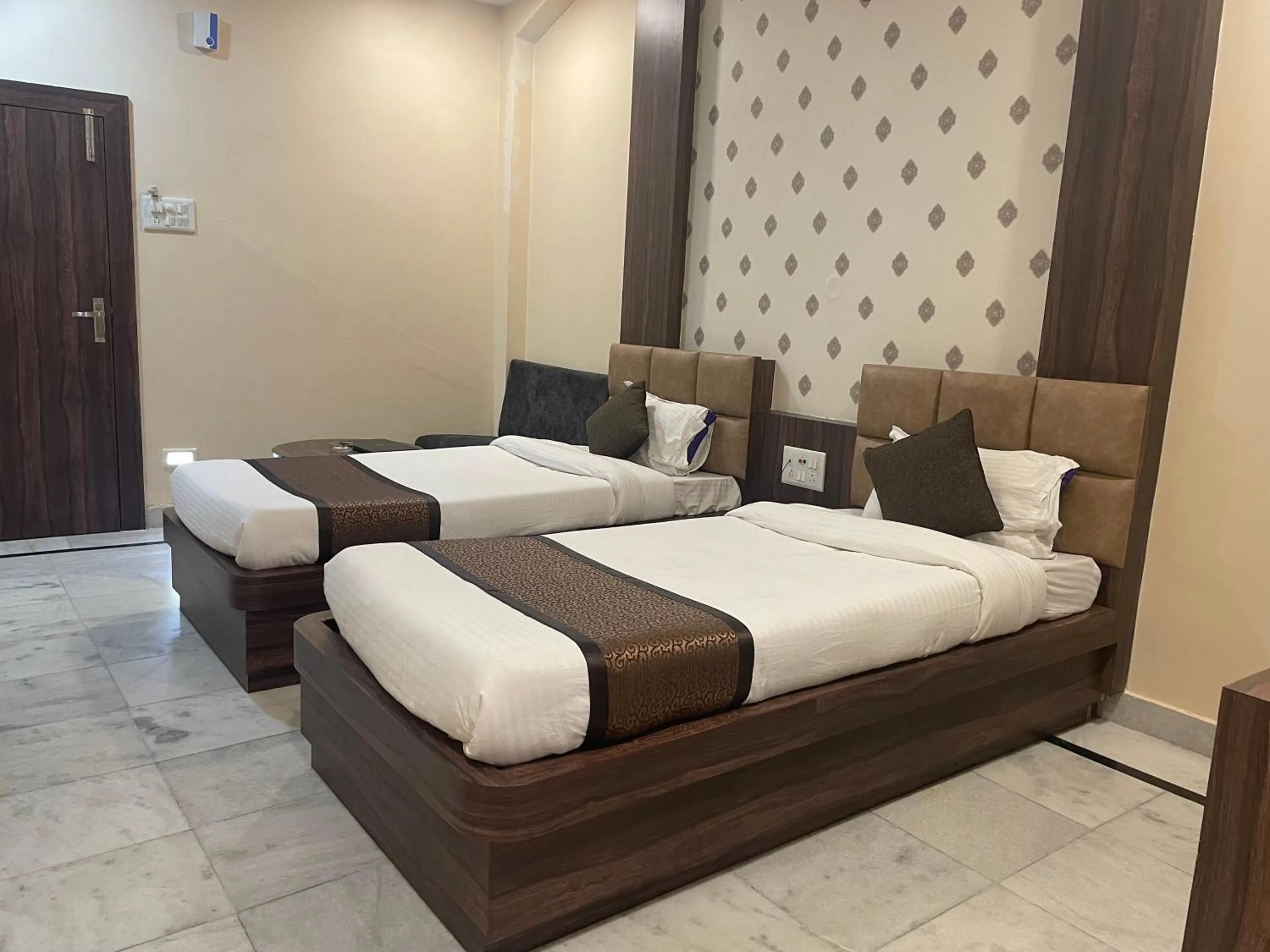 Bed in Hotel Royal Embassy