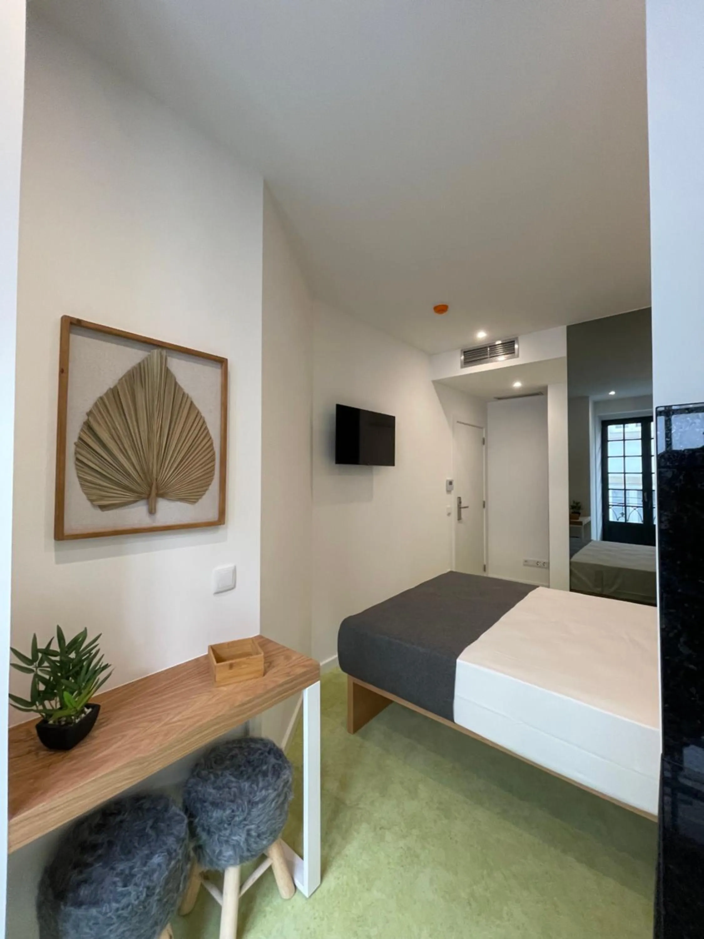 Photo of the whole room, Bed in MyStay Porto São Bento