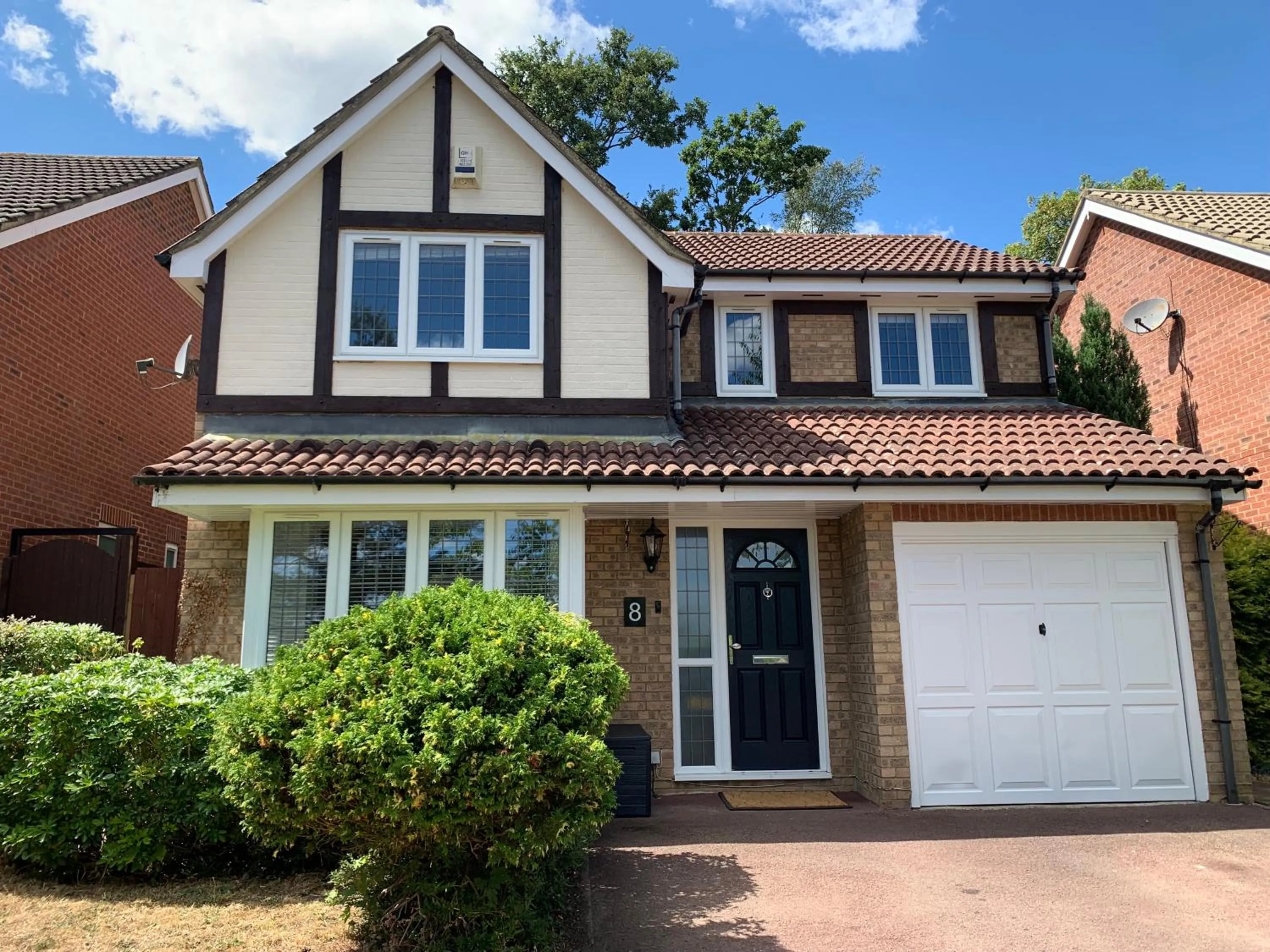 Property building in Virginia Water Family Getaway