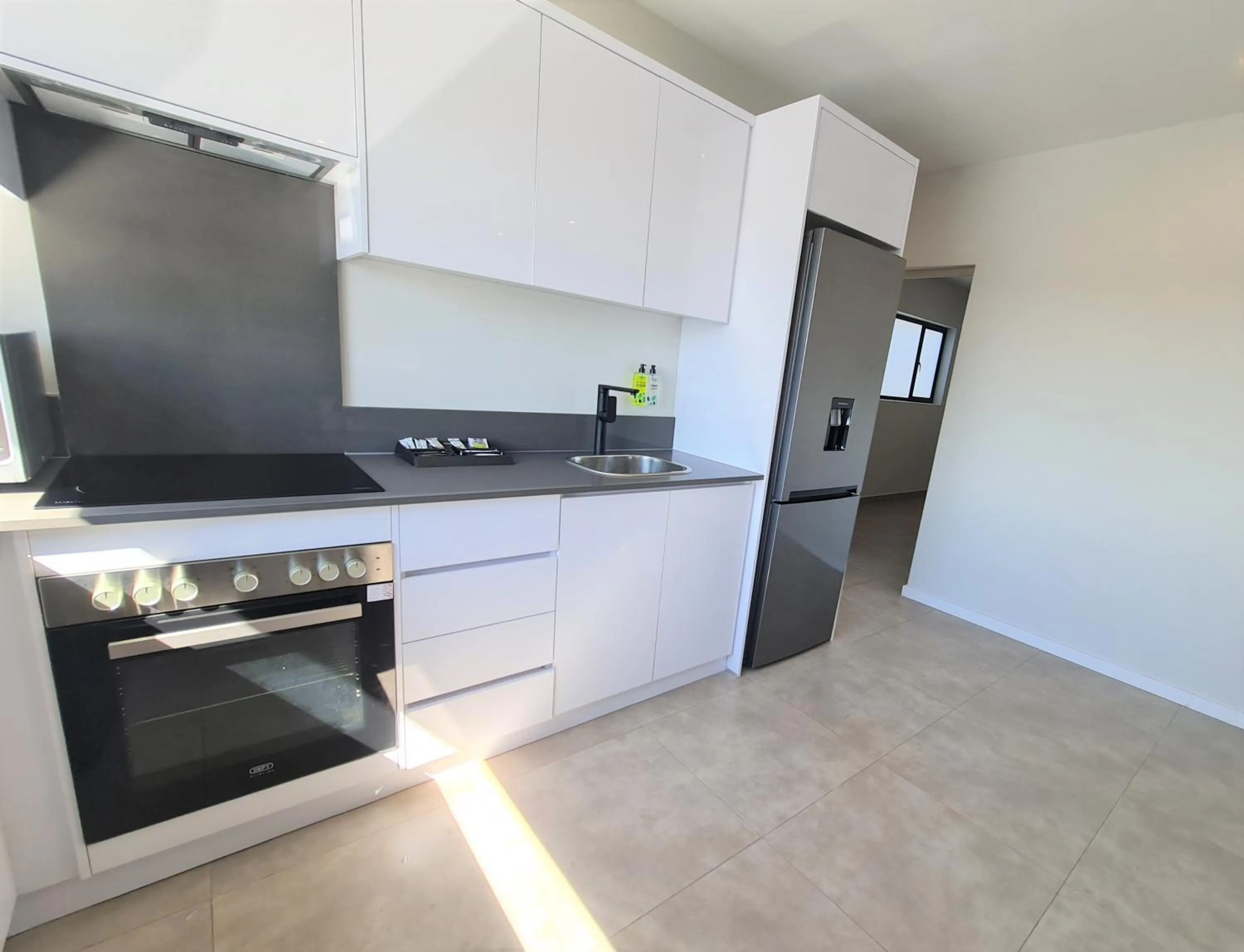 Kitchen or kitchenette in MINT Apartments Greenside