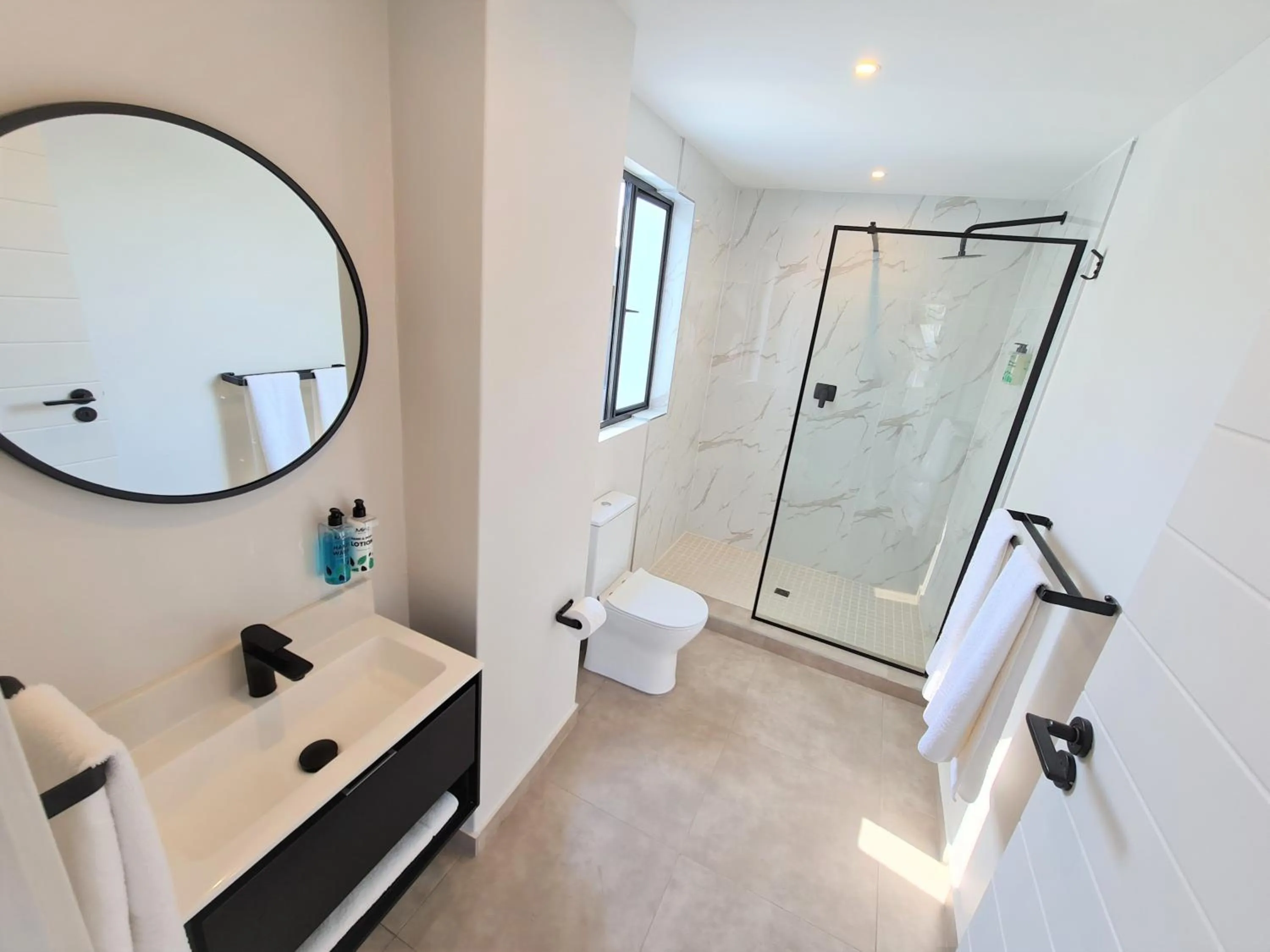 Shower in MINT Apartments Greenside